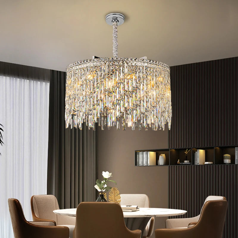 VORELLI® Abruzzi Circular Chandelier hanging above a luxury dining table with chairs