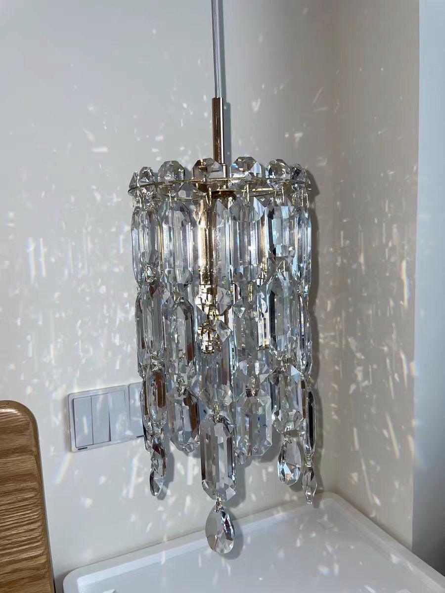 Abruzzi pendant light featuring diamond cut crystal drops, creating refined ambient lighting in a luxury interior by VORELLI®