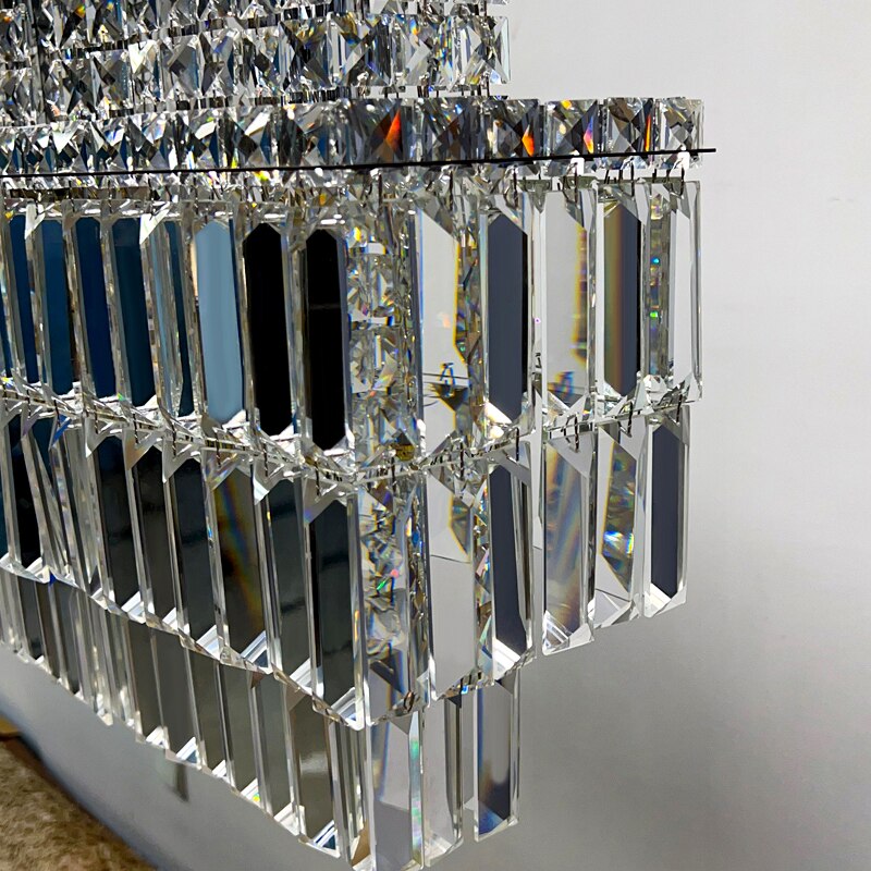 Angled close-up of layered crystal prisms on the VORELLI® Abruzzi Rectangular Chandelier