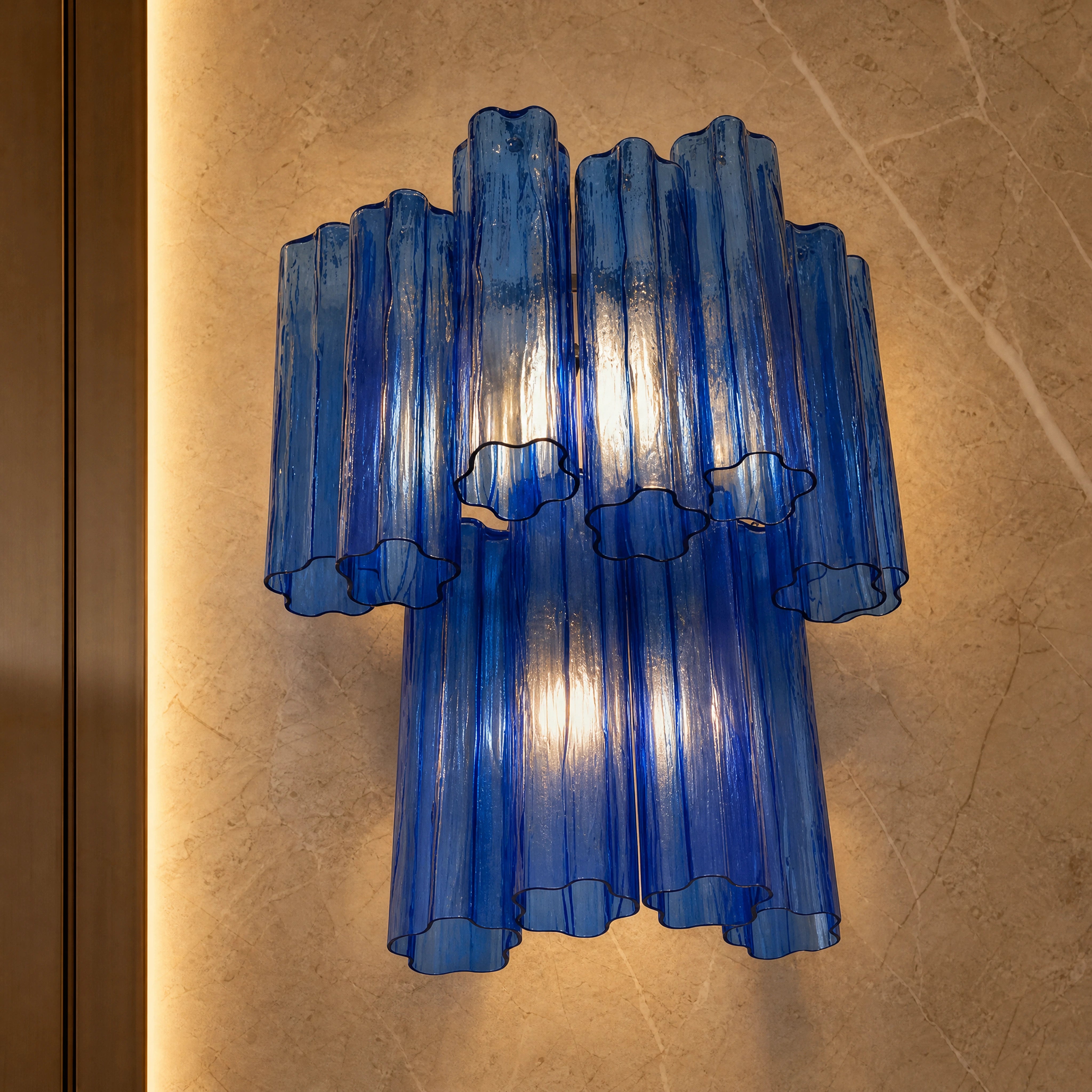 Almeria Tronchi Murano Glass Wall Light close-up luxury lifestyle hero image by VORELLI
