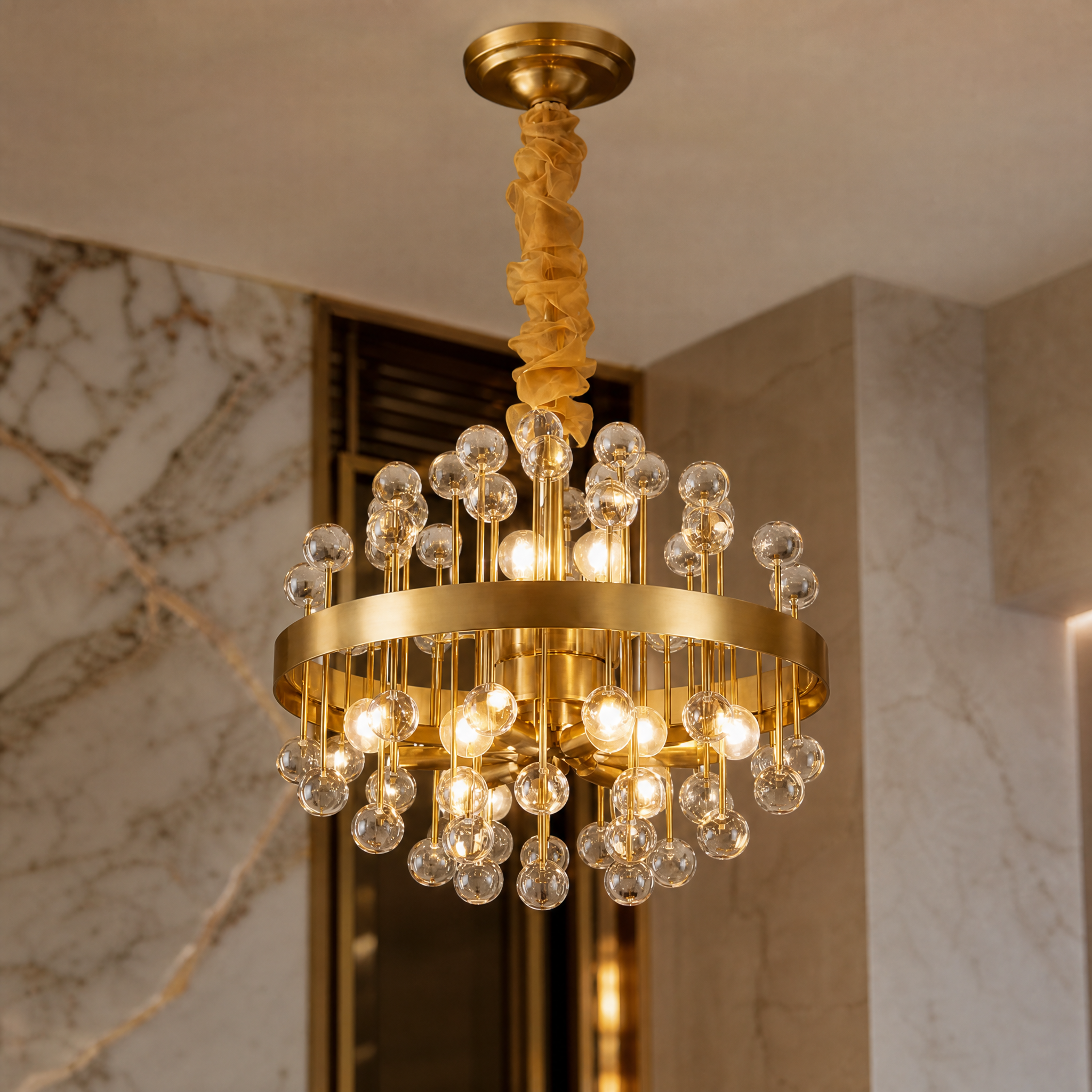 Macro closeup showcasing the premium materials, refined taste, and intricate design details of the VORELLI Alytus circular chandelier.