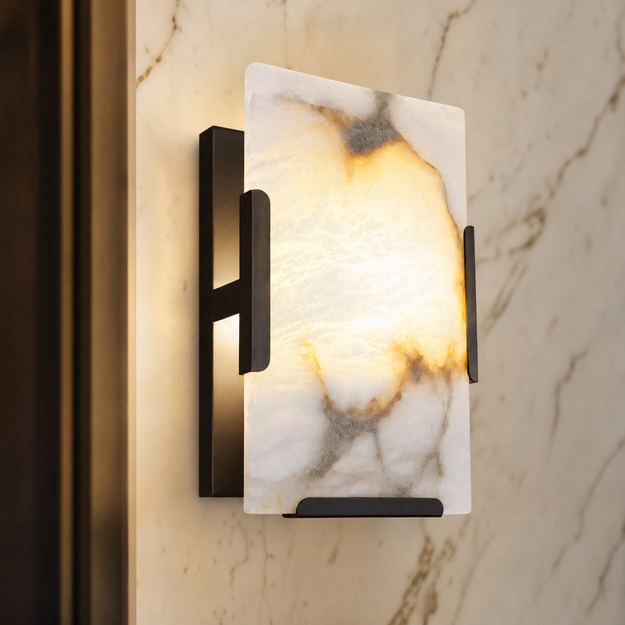 A detailed closeup of the VORELLI Angel Marble Wall Light showcasing the intricate natural veining of the sculptural marble panel and the clean lines of its industrial framing.