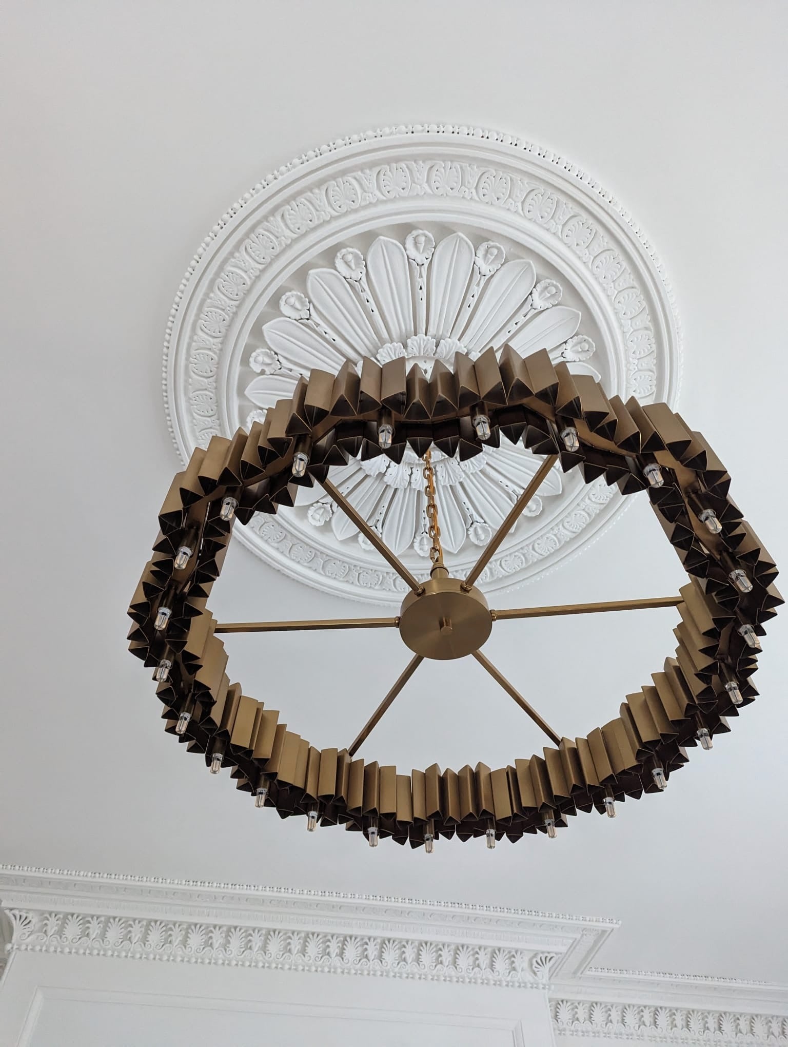 VORELLI Antilia circular chandelier underside view highlighting architectural structure and precision crystal detailing