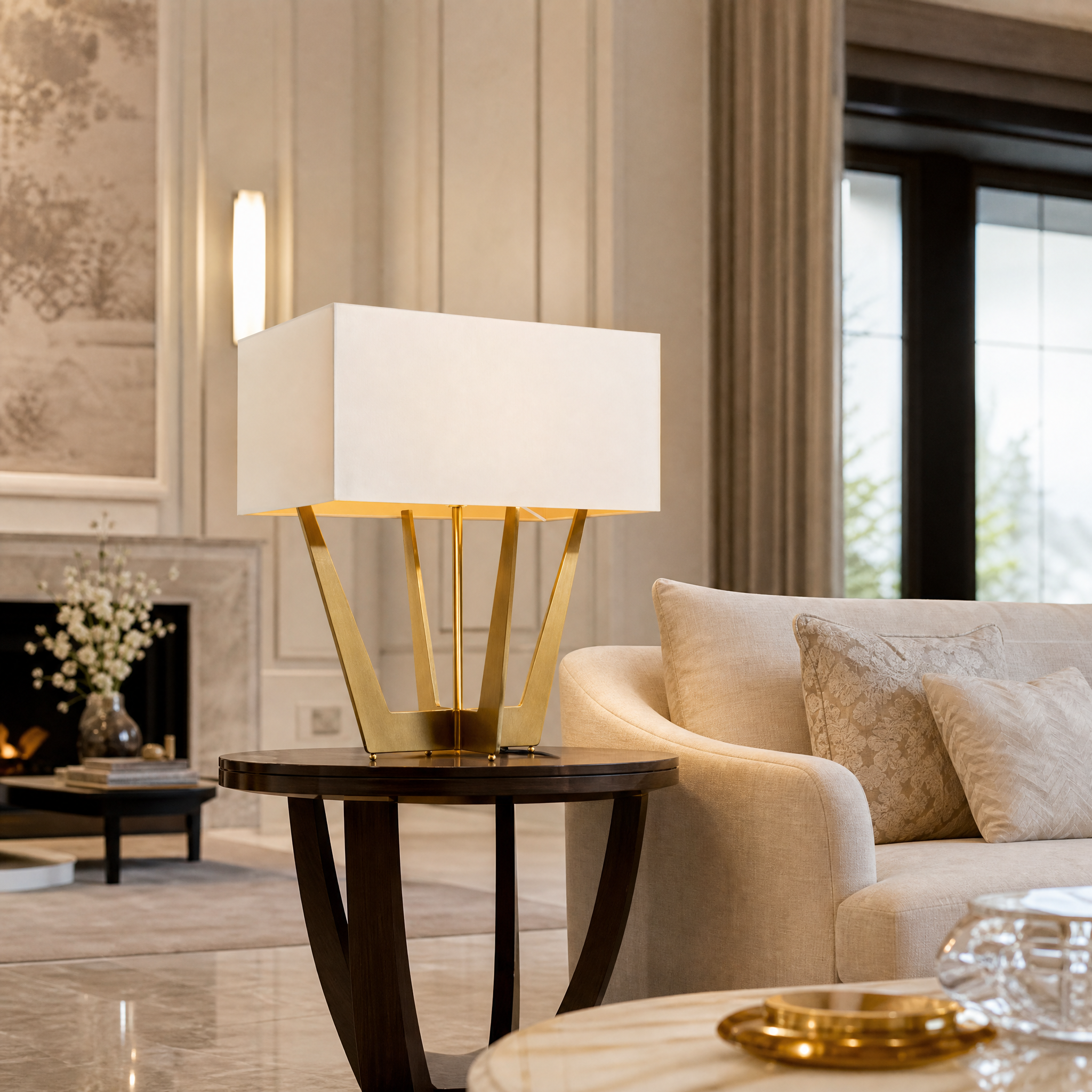 Ardelis Gold Table Lamp by Vorelli showcasing a modern geometric frame in a contemporary residential living room setting.
