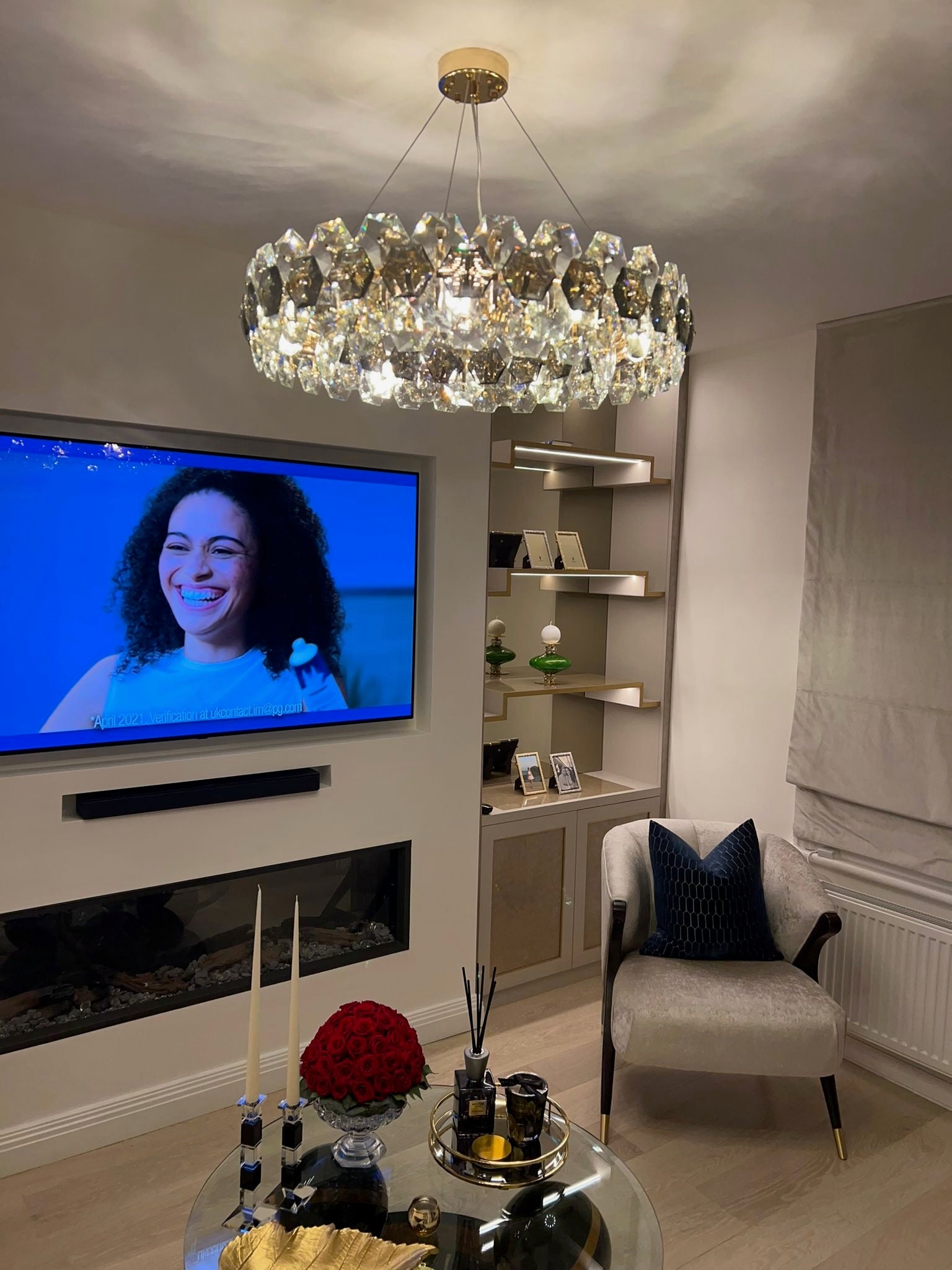 Detailed view of faceted crystal elements on the Astoria circular chandelier by VORELLI®