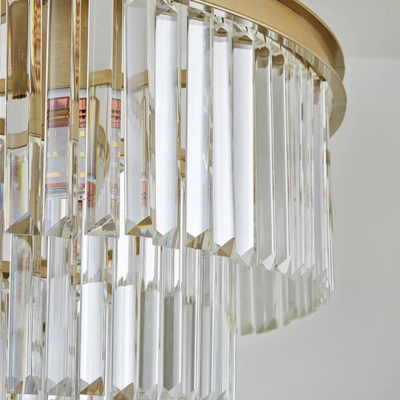 Close-up view of crystal bar tiers on a luxury ceiling light.