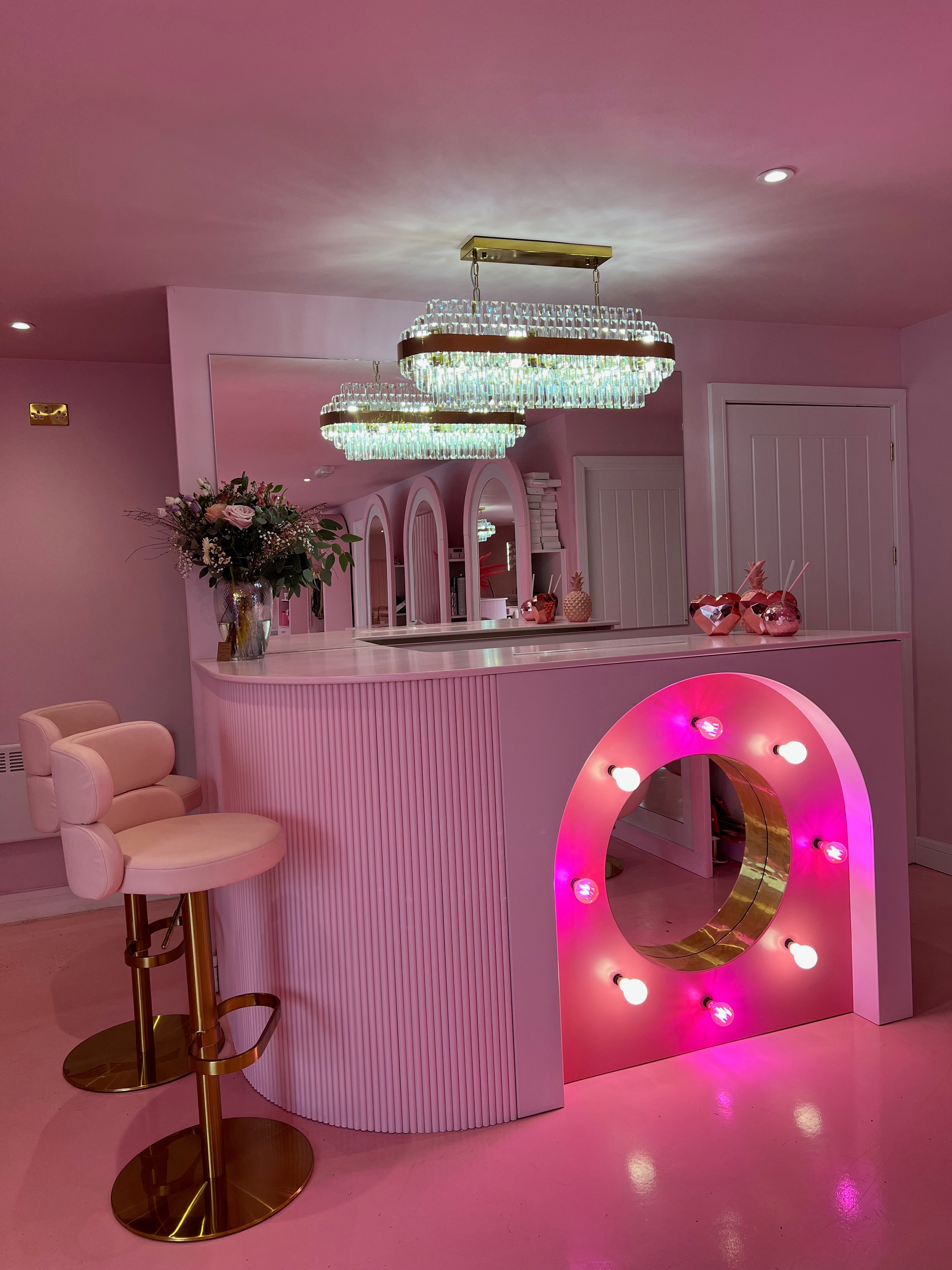 VORELLI Belair rectangular chandelier in a luxury beauty salon interior