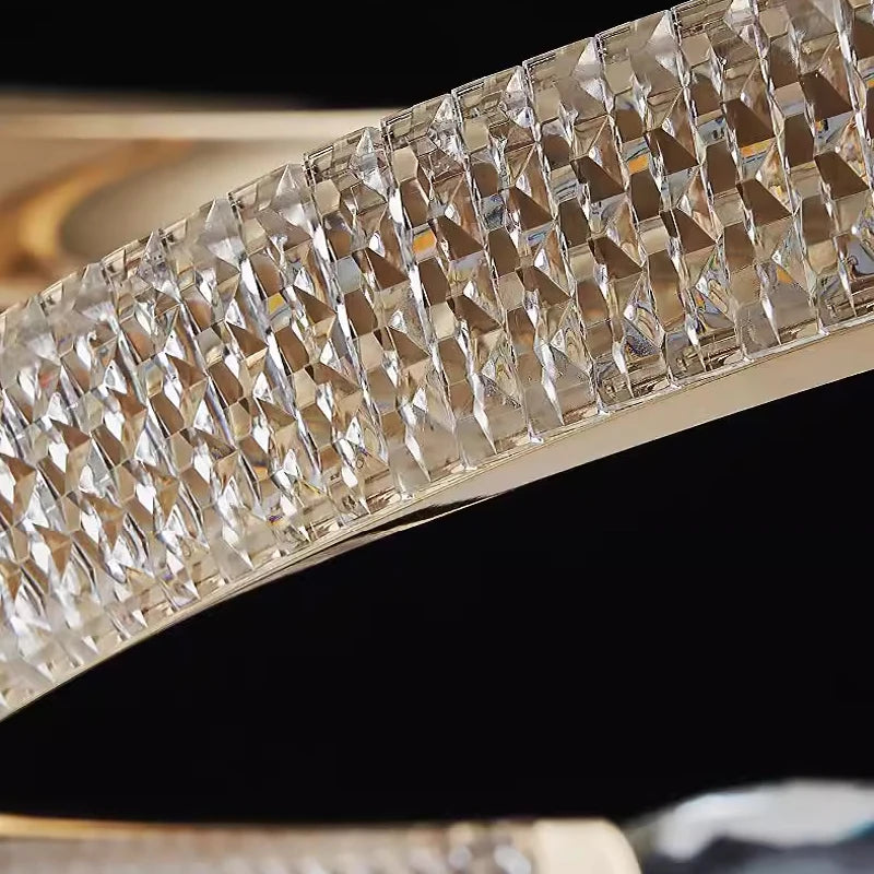 Detailed shot of diamond cut crystal accents on the Belgravia double-ring chandelier.