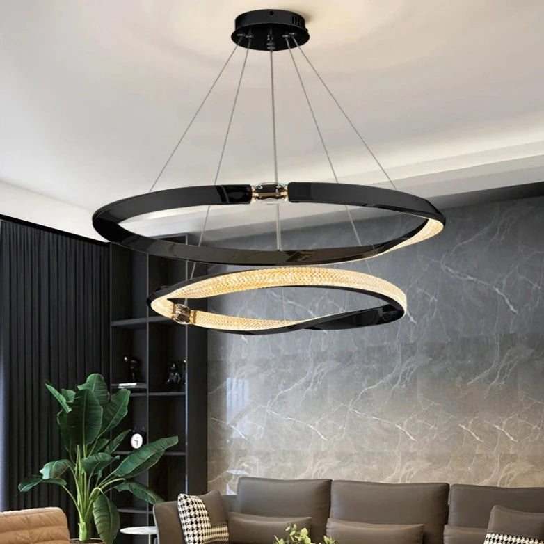 Geometric double-ring chandelier styled in a contemporary dining and living area.