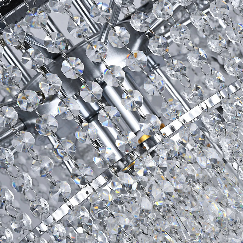 Close-up of diamond cut crystals highlighting the chandelier’s brilliant refraction.