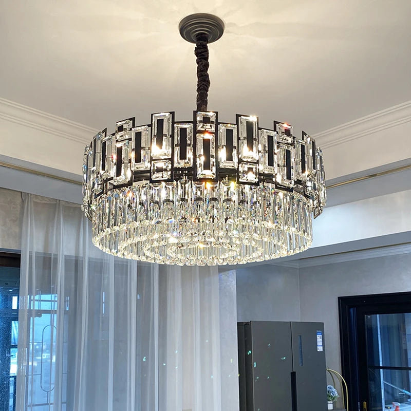 Luxury circular chandelier with mixed rectangle and square crystals in an elegant interior.