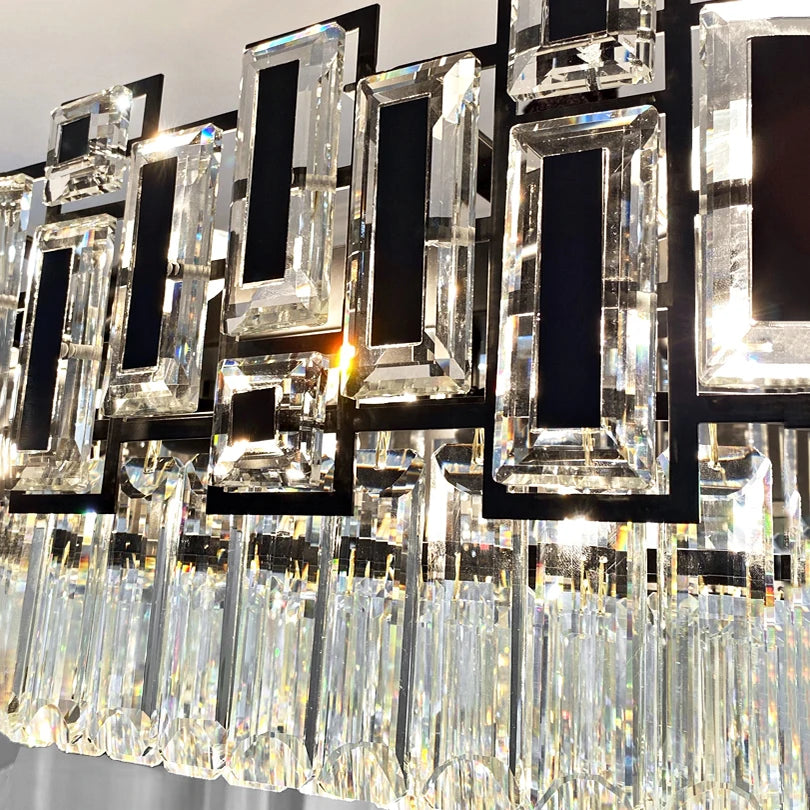 Close-up of rectangular and square crystal bars set around the chandelier’s frame.