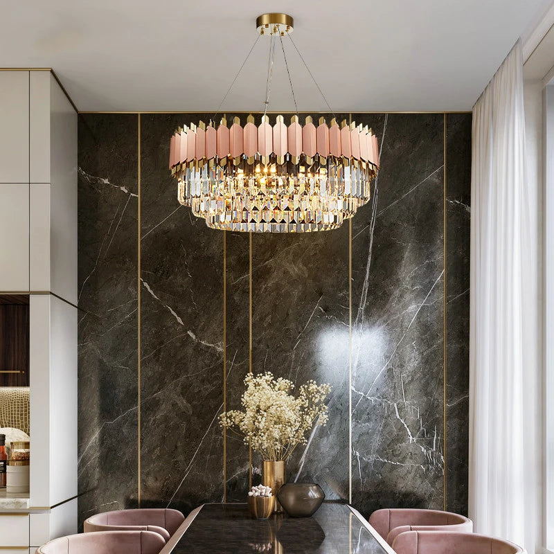 Bianca circular chandelier with rose gold frame and pink crystal bars in a luxury dining space.