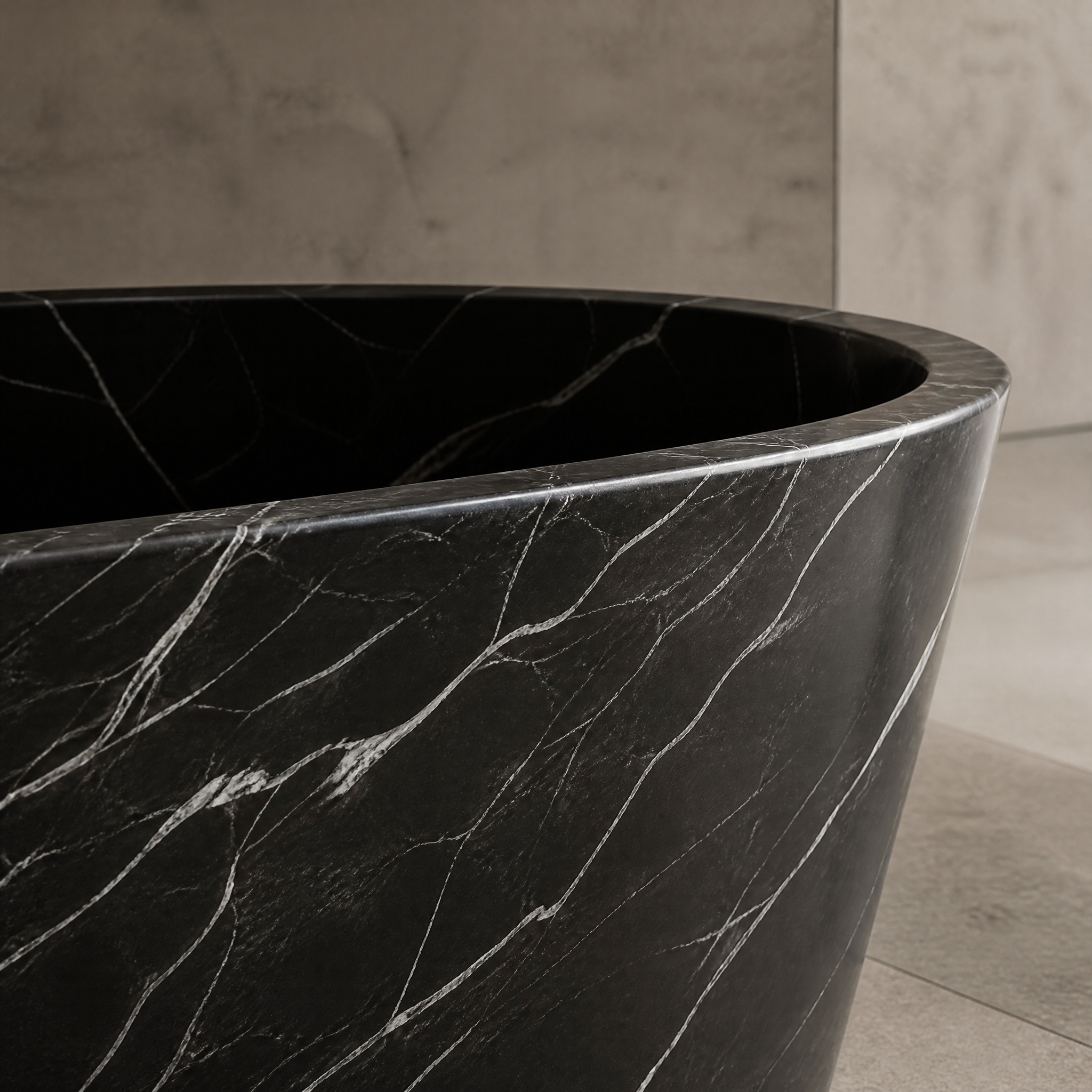 Black Marquina Marble Freestanding Bathtub - Tapered stone craftsmanship detail image by VORELLI