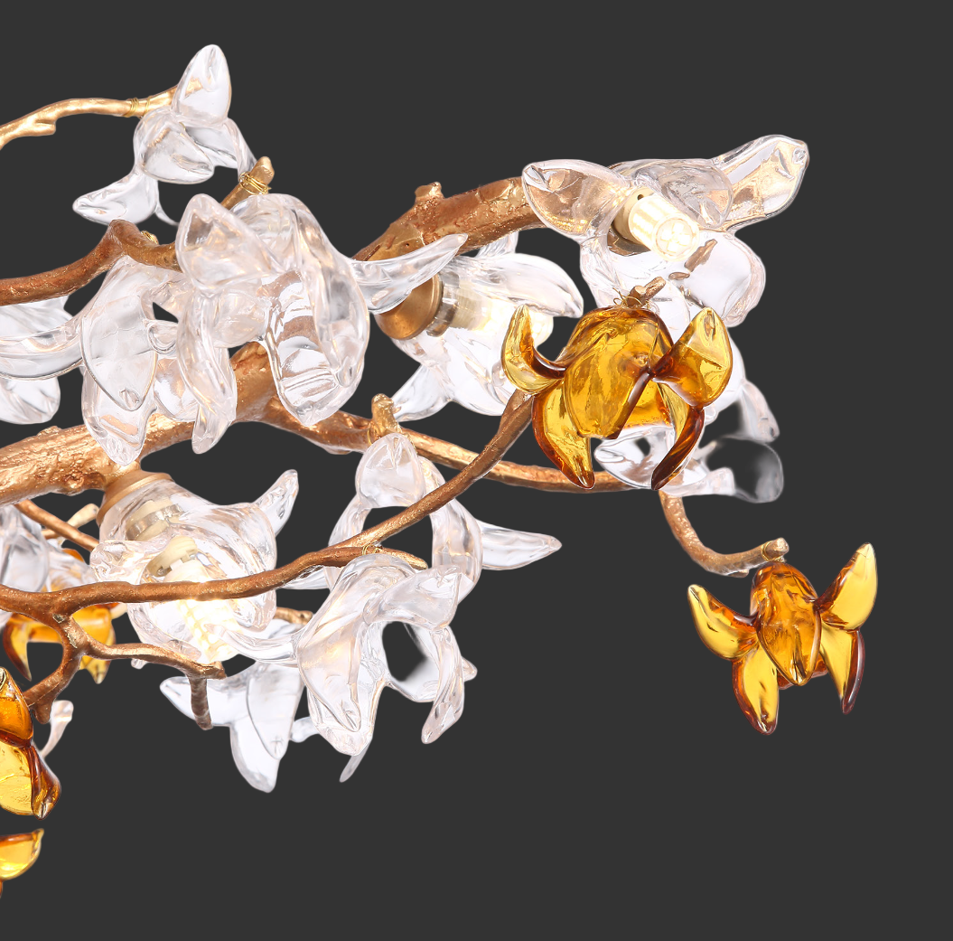 Close-up view of the Bloom pendant light showing intricate glass flowers and organic branching design.