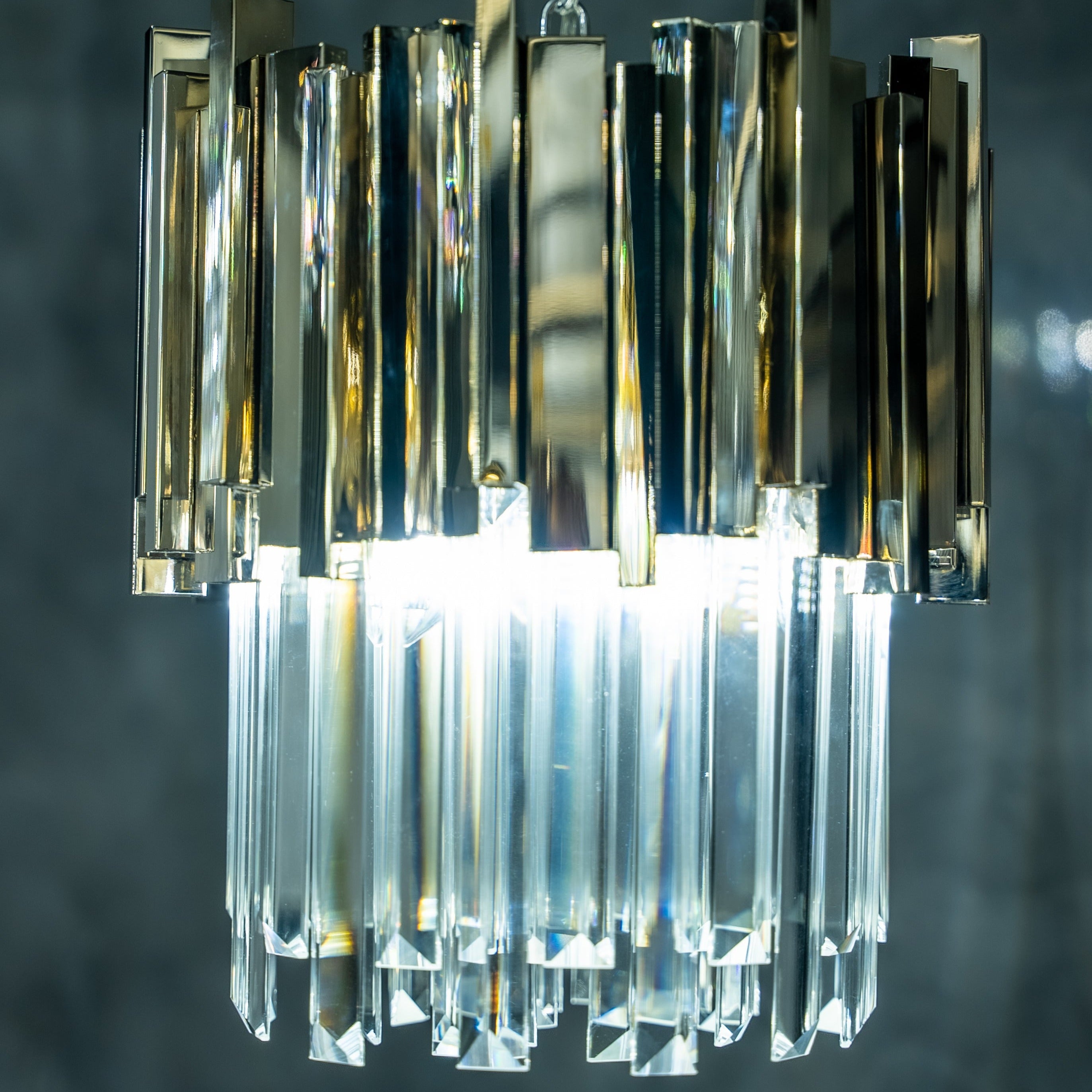 Detailed view of the Boeotia Pendant’s vertical crystal bars illuminated in a modern interior.