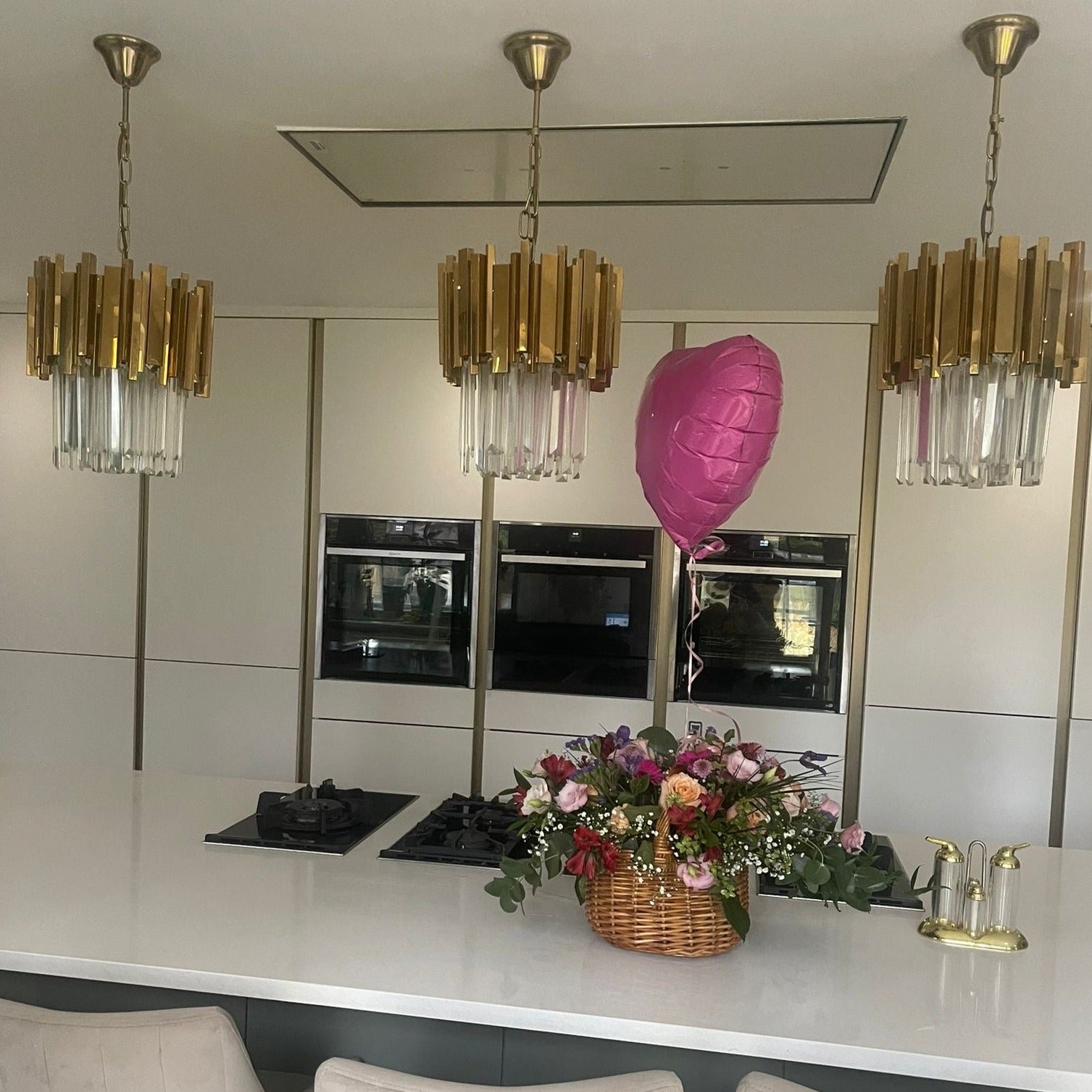 Boeotia Pendant lighting a stylish living and dining space with contemporary décor.