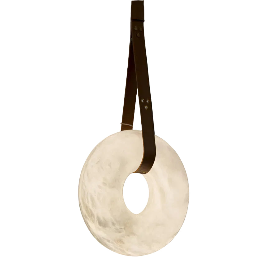 Botticino Marble Pendant Light featuring a sculpted circular marble disc suspended by leather straps.