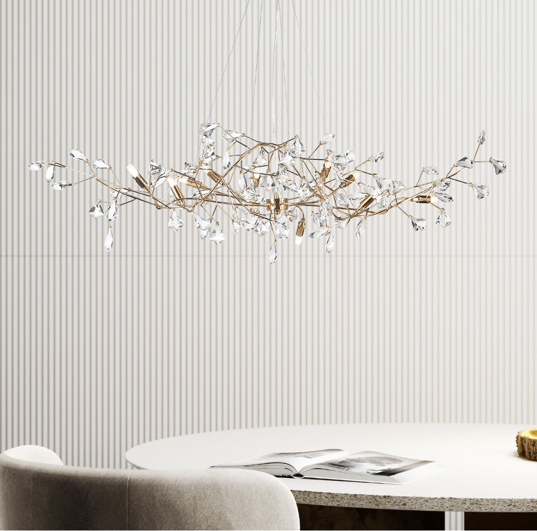 Brisella Rectangular Chandelier suspended over a contemporary dining space, showcasing its elongated branch-inspired design and sparkling diamond-cut crystals.