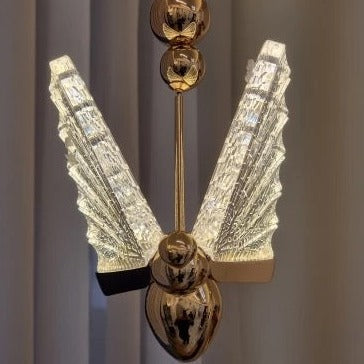 Close-up of the grey glass butterfly element on the Butterfly Pendant Light, highlighting its delicate sculptural form.