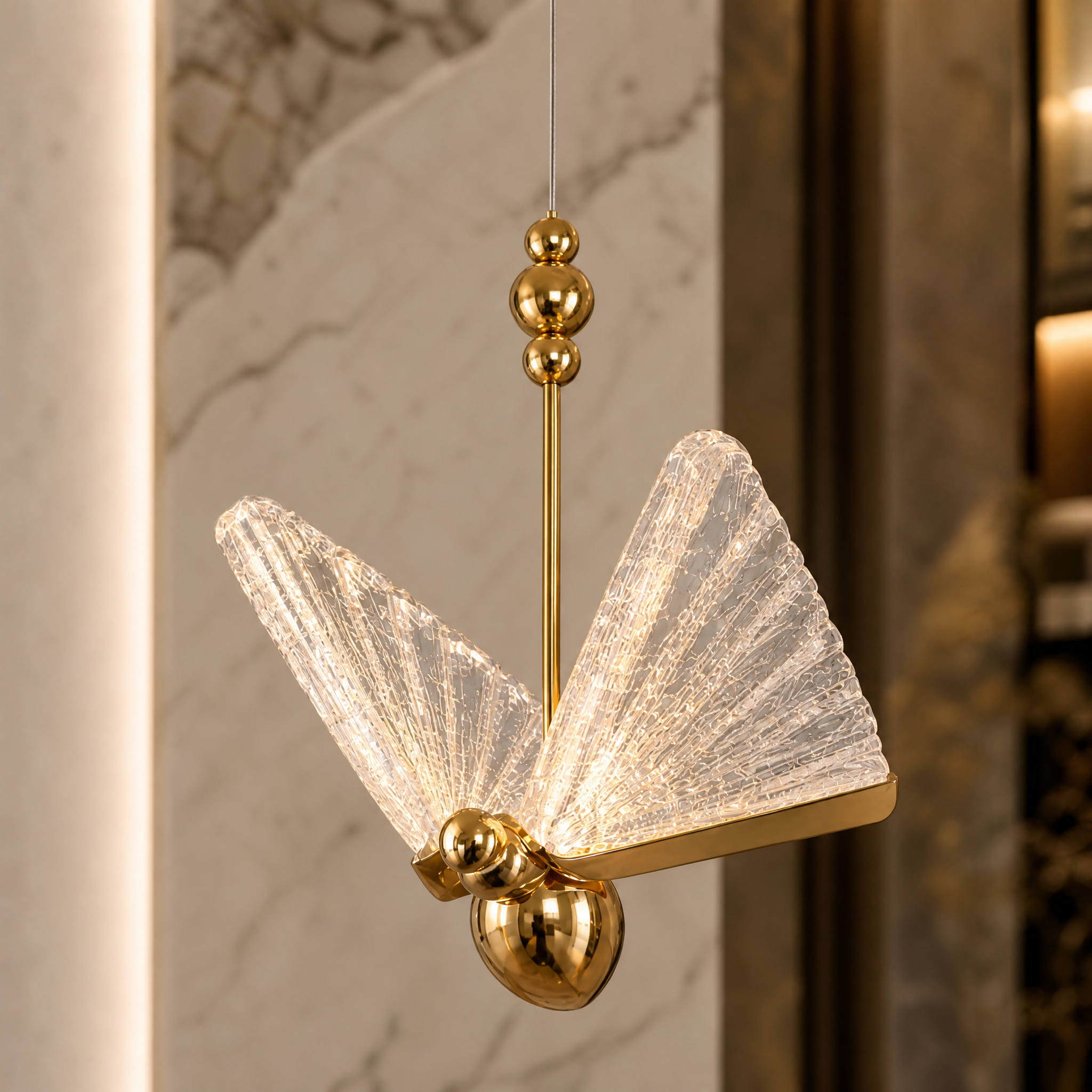 Close-up shot of the VORELLI Butterfly Pendant Light highlighting the delicate wings and premium artistic craftsmanship.
