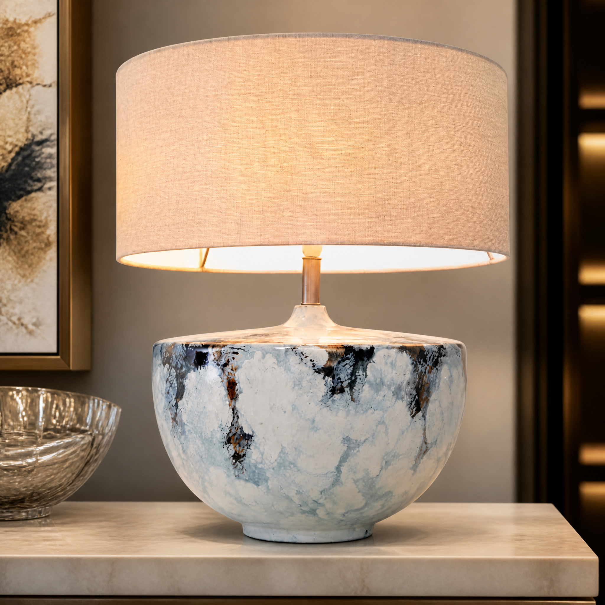 Close-up shot of the artistic VORELLI Caldera table lamp showcasing the detailed cloud-inspired blue and cream enamel texture.