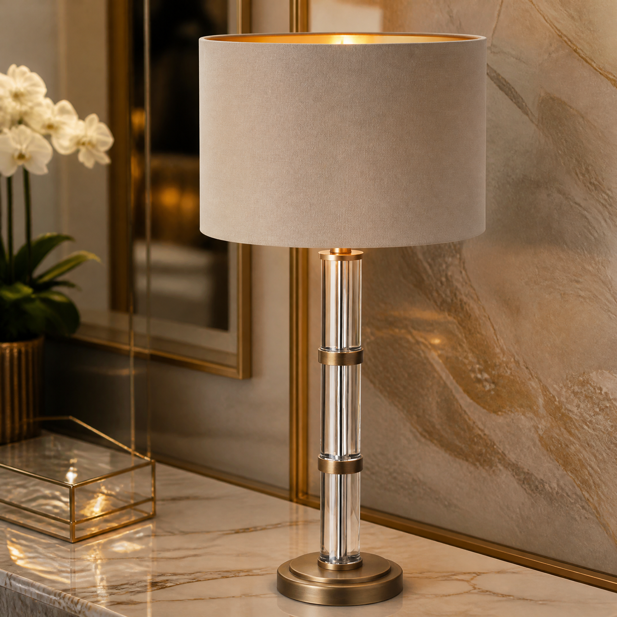 Macro shot of the VORELLI Caldrin lamp showing the stacked clear crystal accents and refined antique brass silhouette.