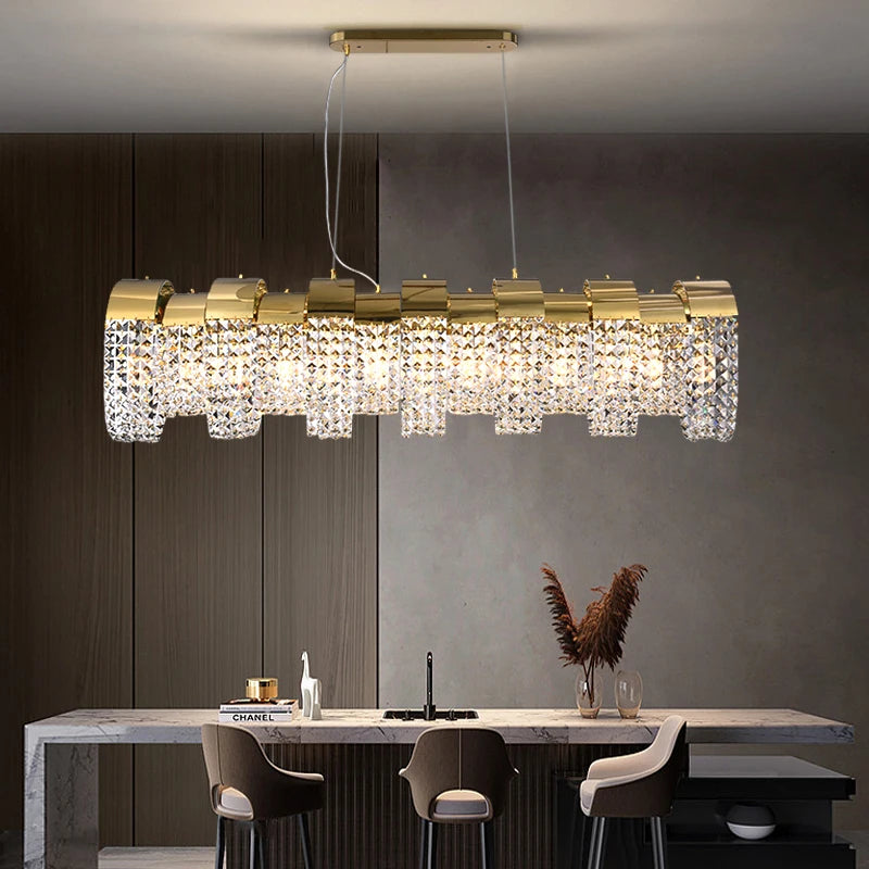 Capri Rectangular Chandelier with diamond-cut square crystals illuminating a luxury dining room interior.