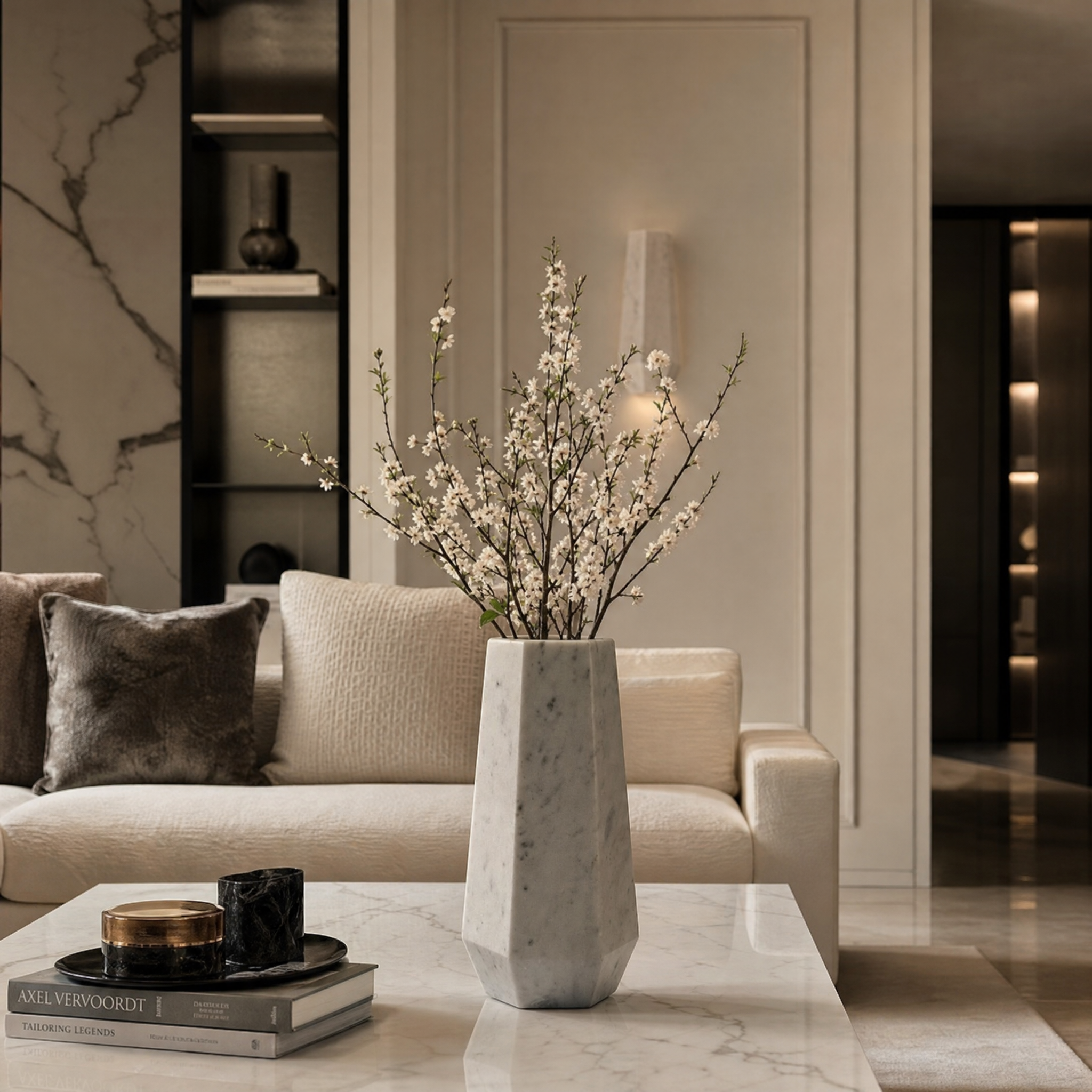 Luxury residential living room featuring the Vorelli Cervino white marble vase on a modern console table.
