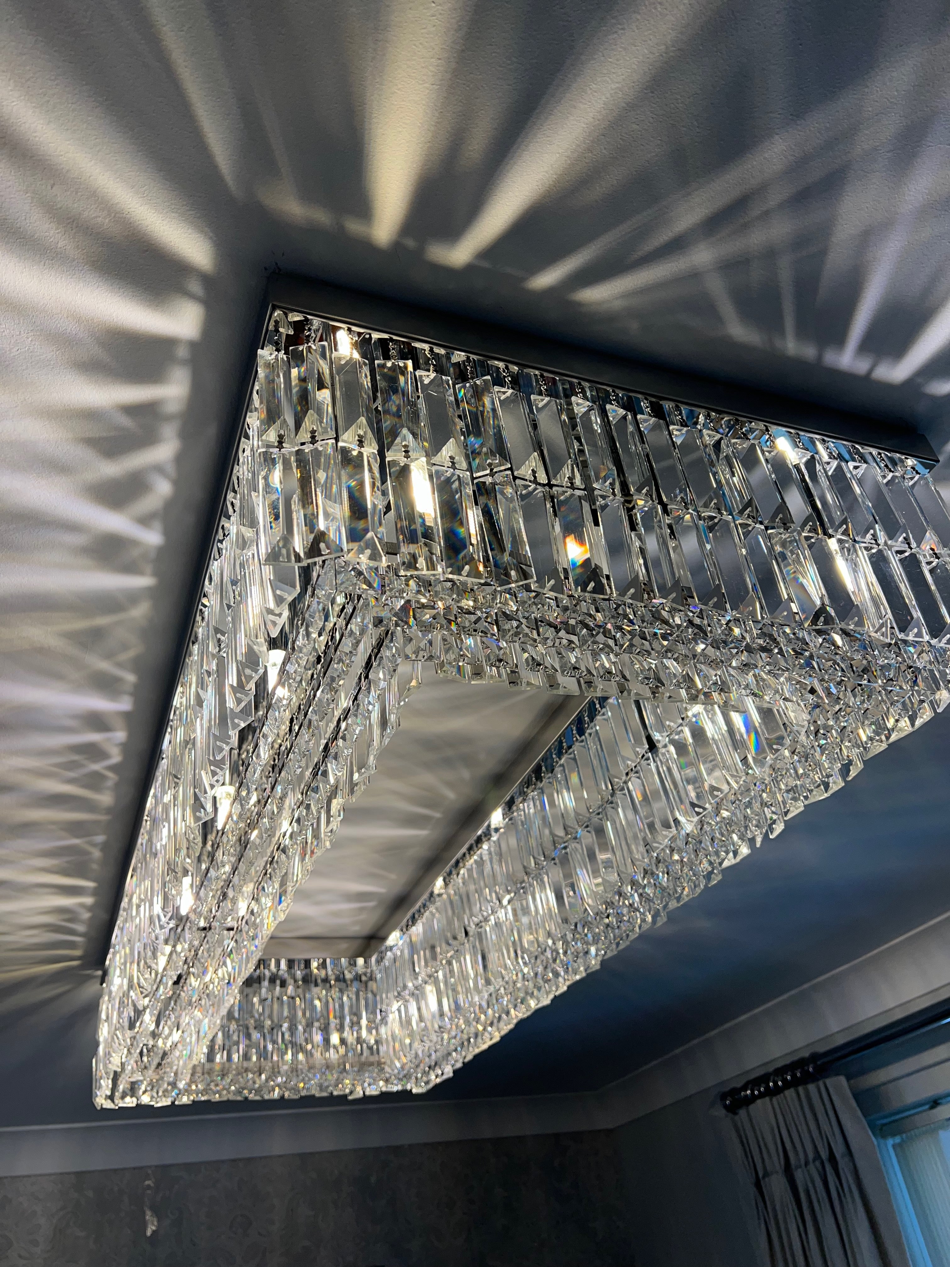 Close up of diamond cut crystal detailing on a luxury rectangular ceiling light