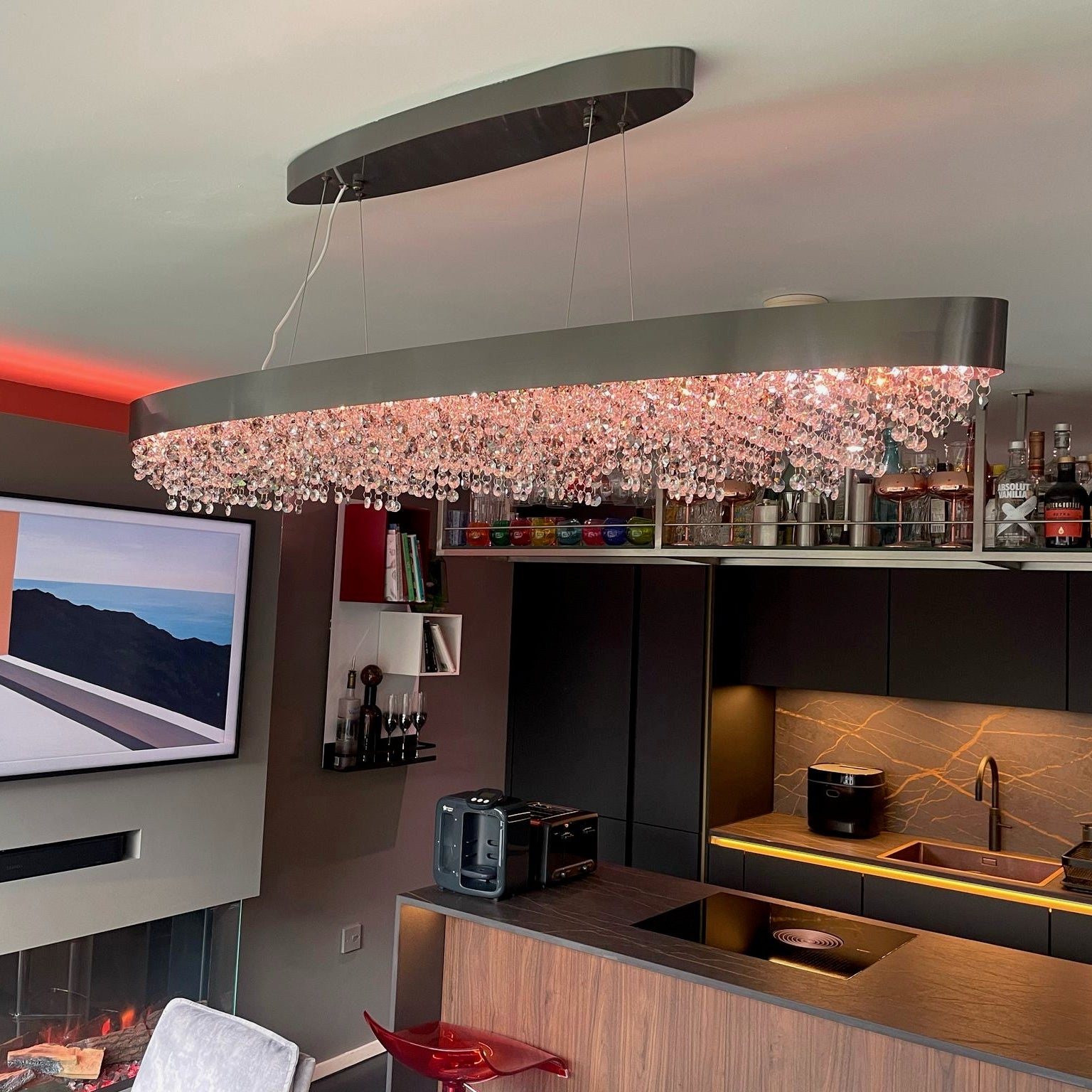 VORELLI® Donatello rectangular chandelier in a luxury kitchen with warm ambient LED crystal illumination