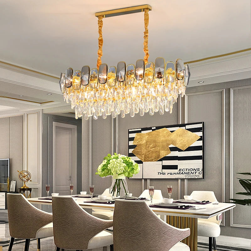 Edmond rectangular chandelier with diamond cut crystal drops above a luxury dining table