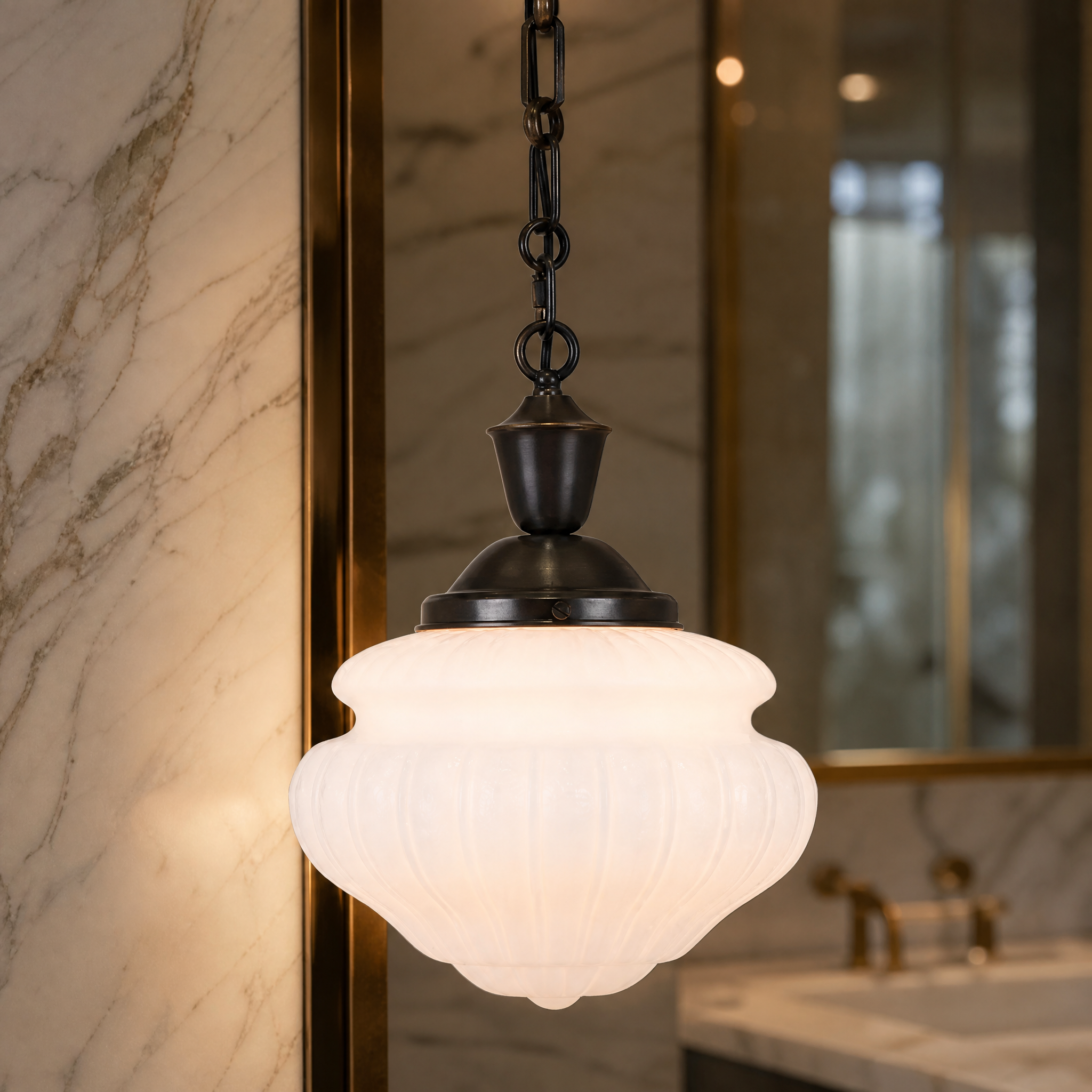 A detailed close-up of the VORELLI Farella Pendant Light, highlighting the refined artistry and delicate texture of its early 20th-century style opaline glass shade.