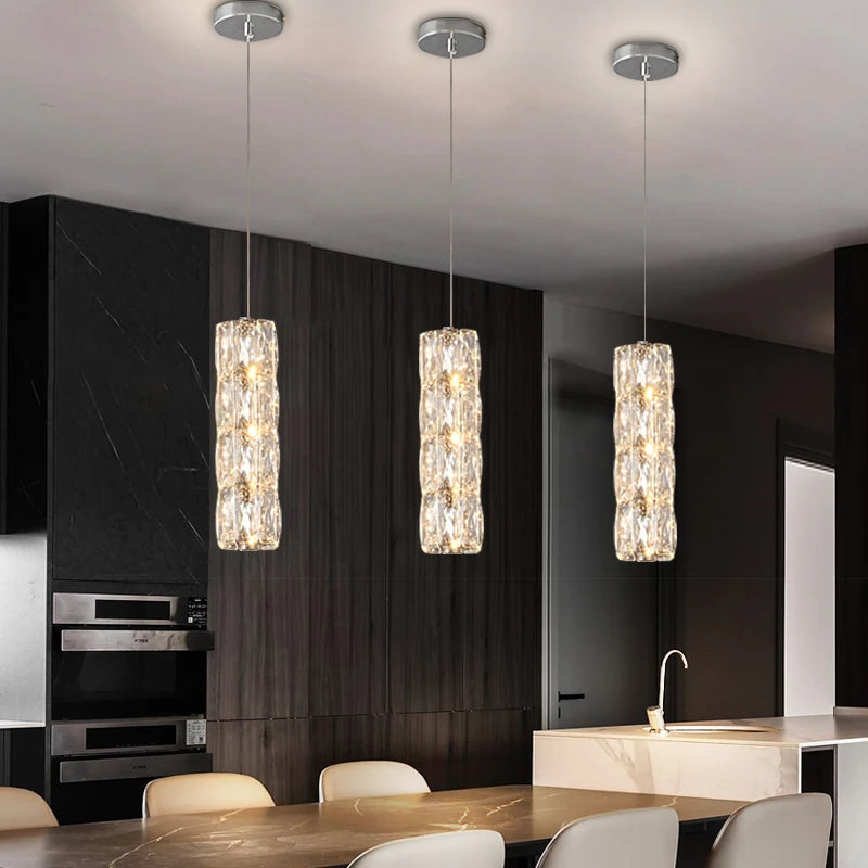 Gaia pendant light installed above a modern kitchen island