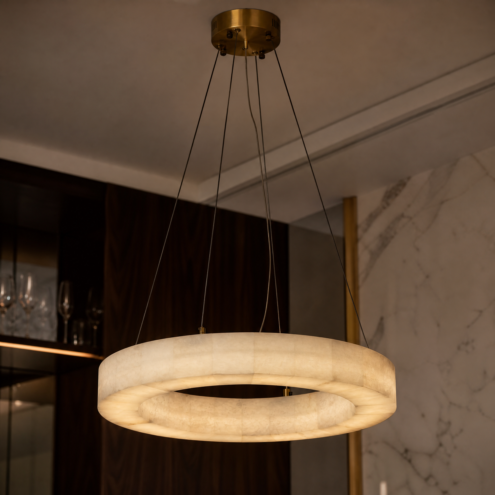 A detailed closeup showcasing the softly veined premium marble and seamless craftsmanship of the VORELLI Halo Circular Chandelier.