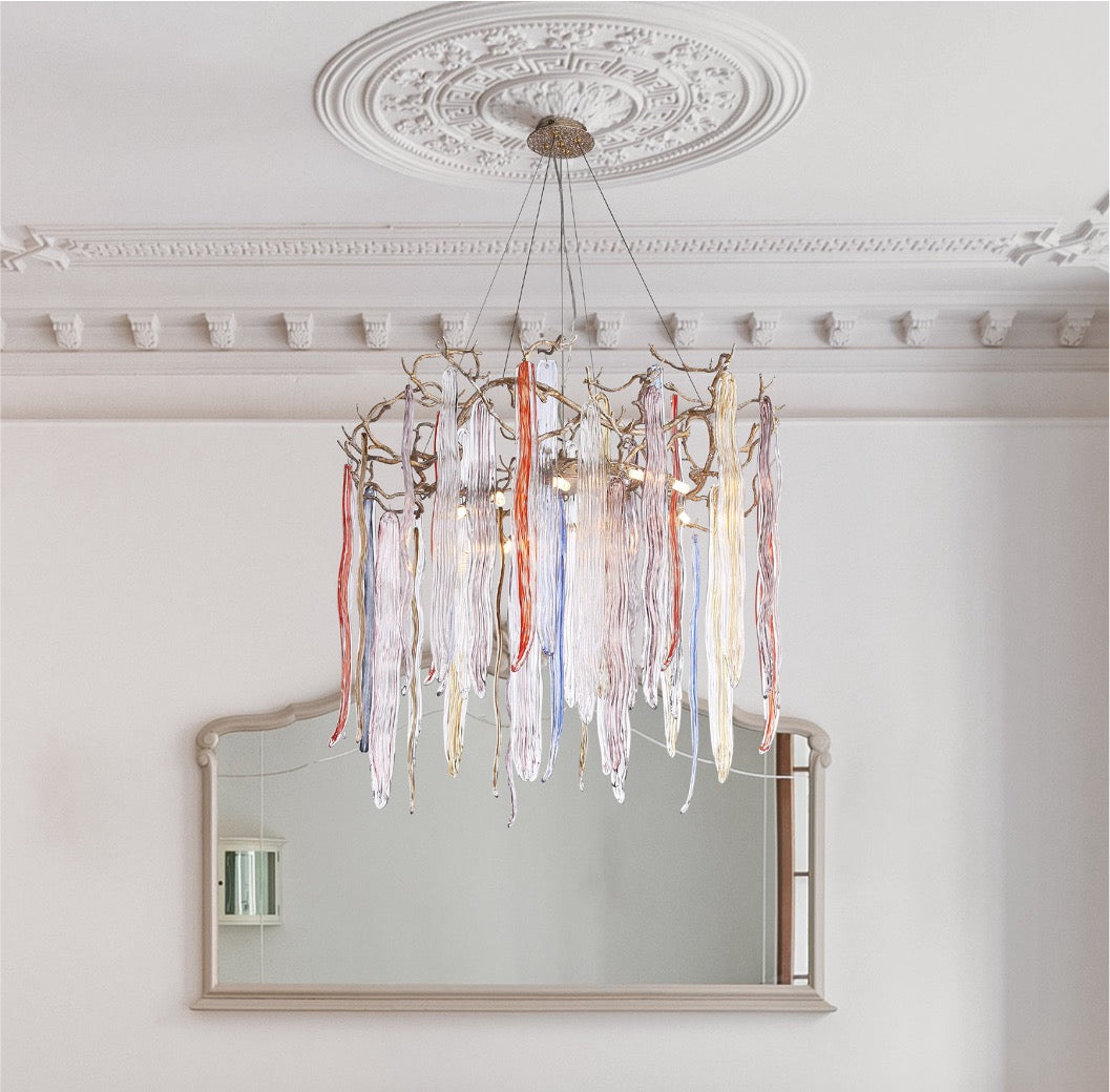 Icicle Circular Chandelier styled above a luxury dining table in a refined interior