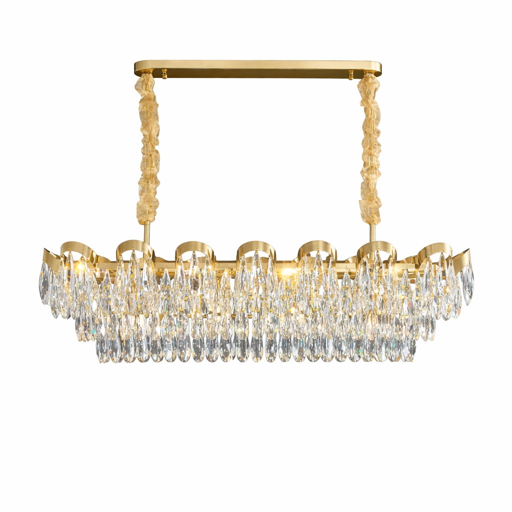 VORELLI Isso Rectangular Chandelier installed in a luxury residential dining room, casting a warm glow through diamond-cut teardrop crystals.