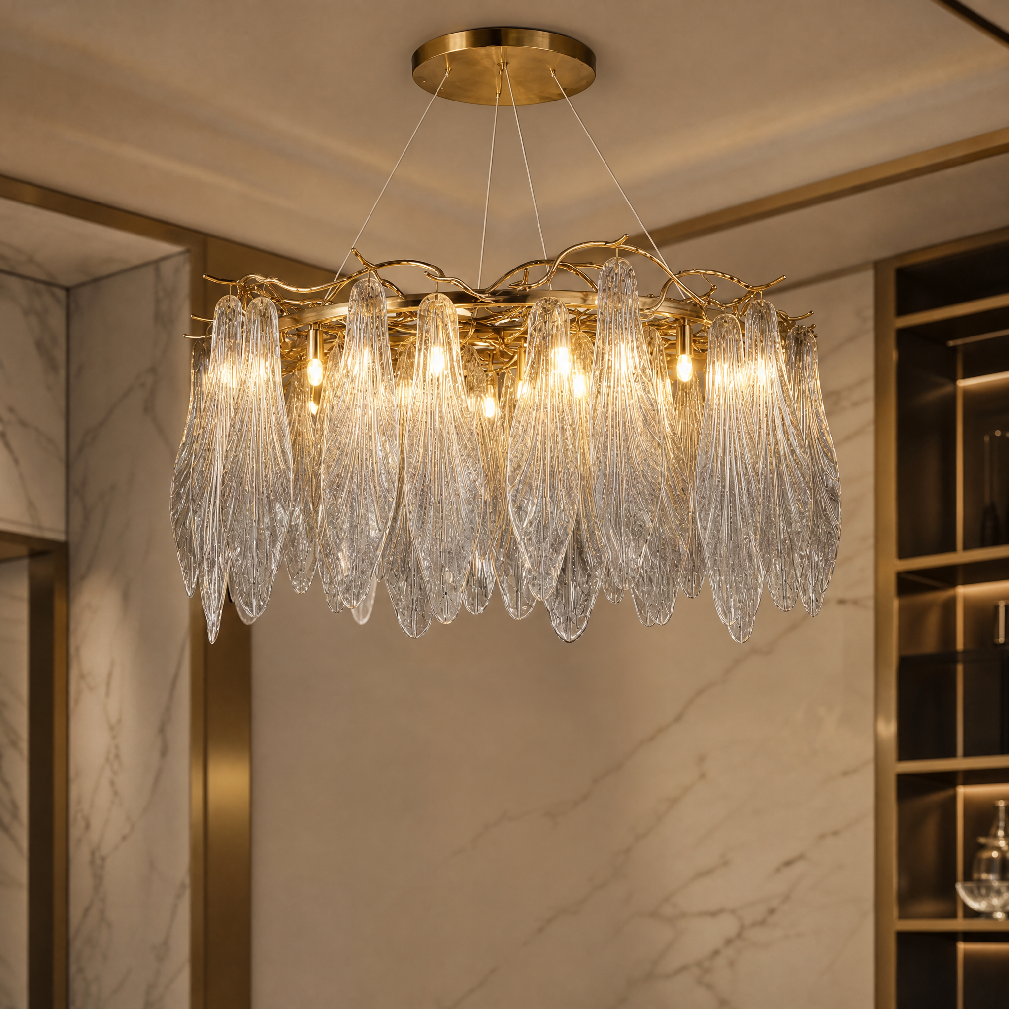 Close-up detail of the VORELLI Larvotto circular chandelier, showcasing the organic texture of the branches and the elegant, light-capturing design of the flowing glass leaves.