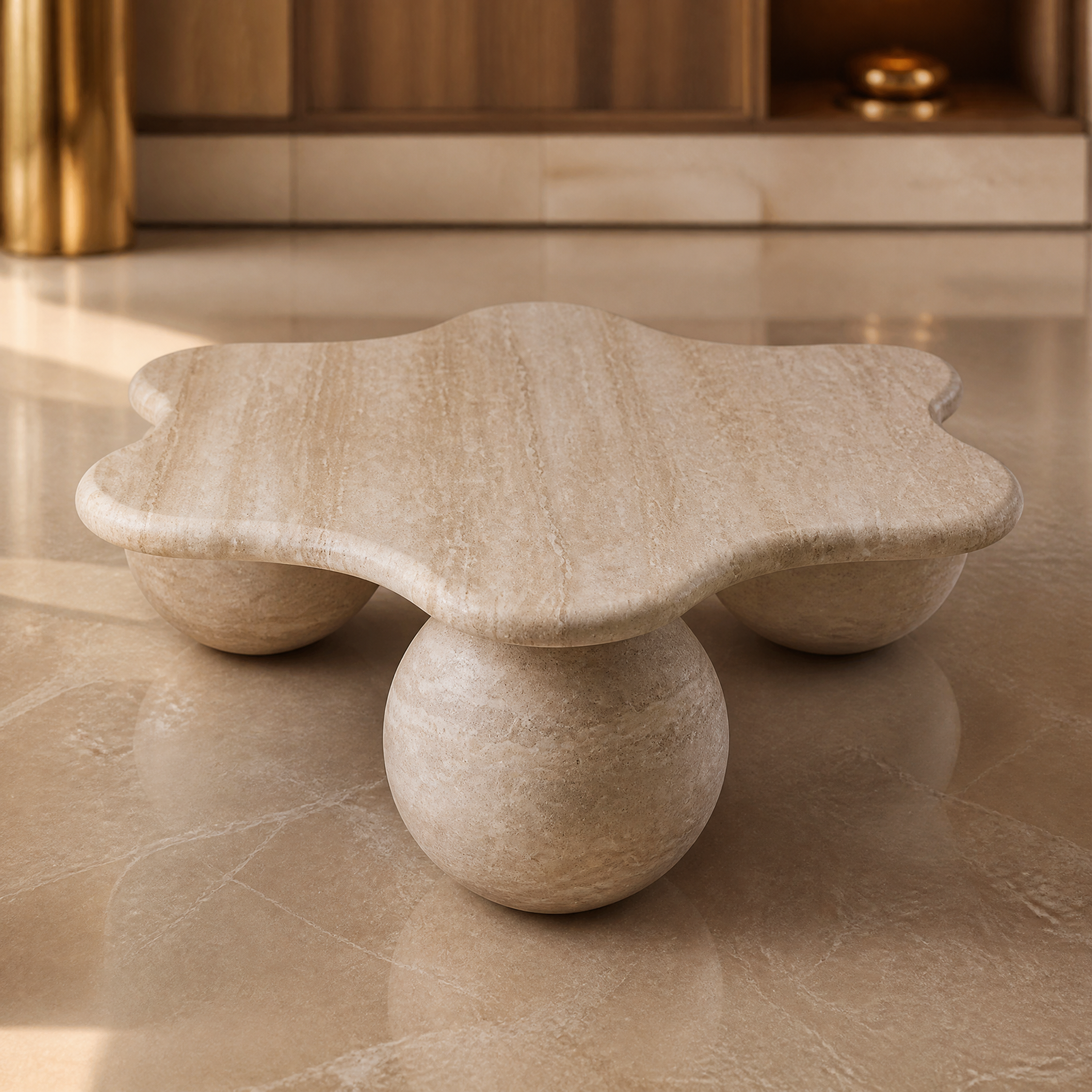 Detailed closeup of the VORELLI Liburno coffee table showing the beautiful texture of the solid Roman travertine tabletop and sculptural sphere supports.