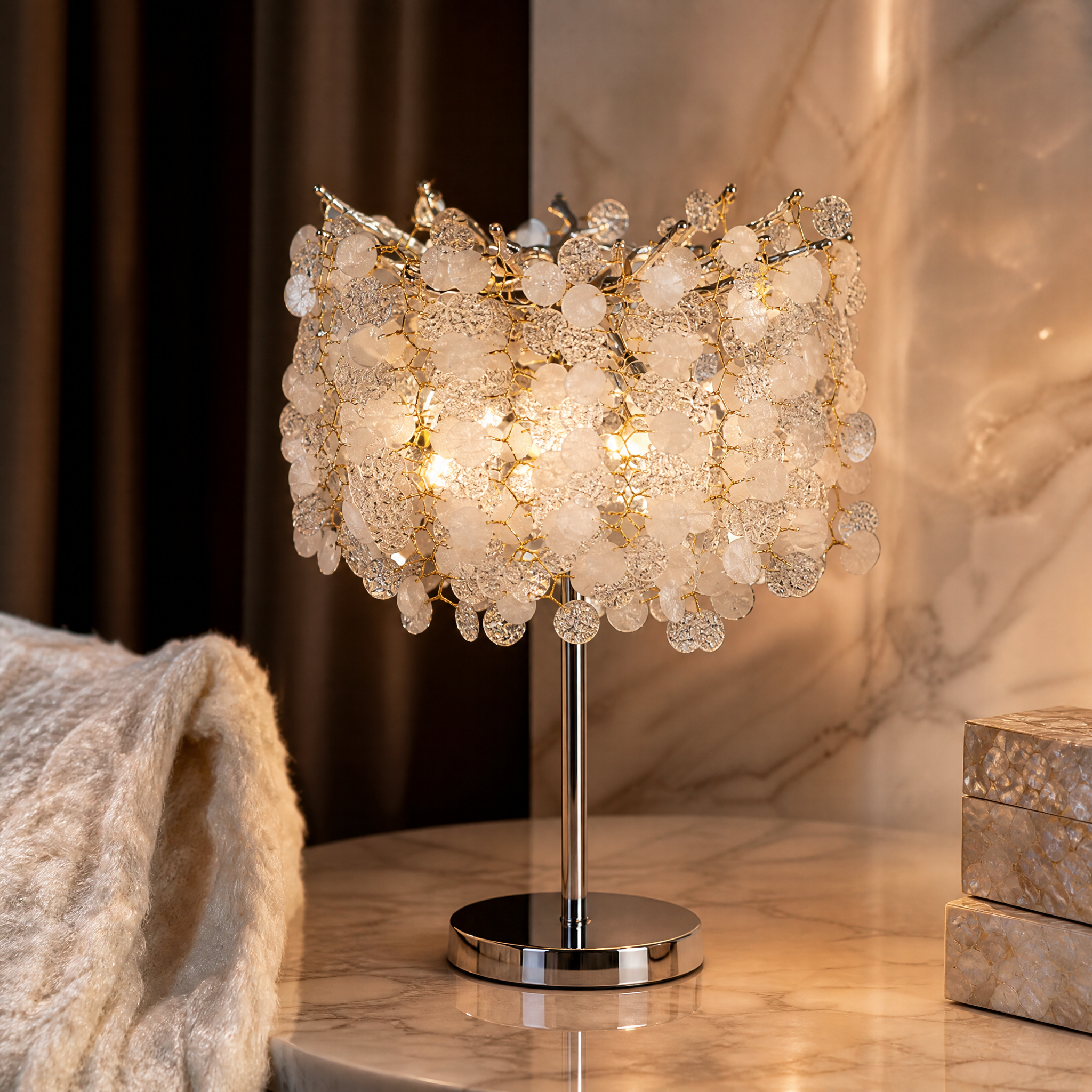 Macro shot of the Vorelli Lunaria Table Lamp focusing on the intricate textured glass coin-like crystals and metallic branch frame.