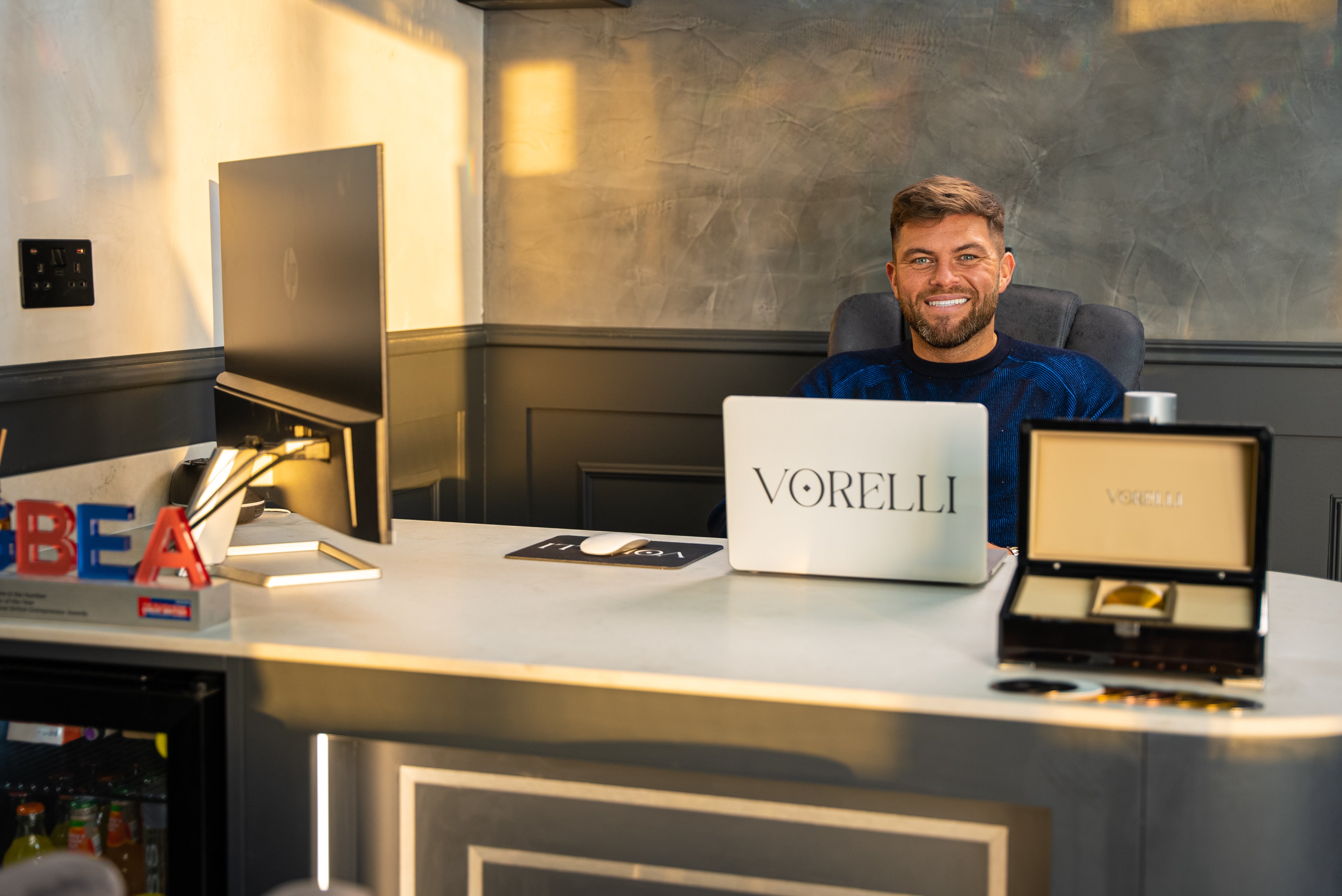 VORELLI luxury lighting design consultation for bespoke chandeliers, staircase lighting and double height interiors