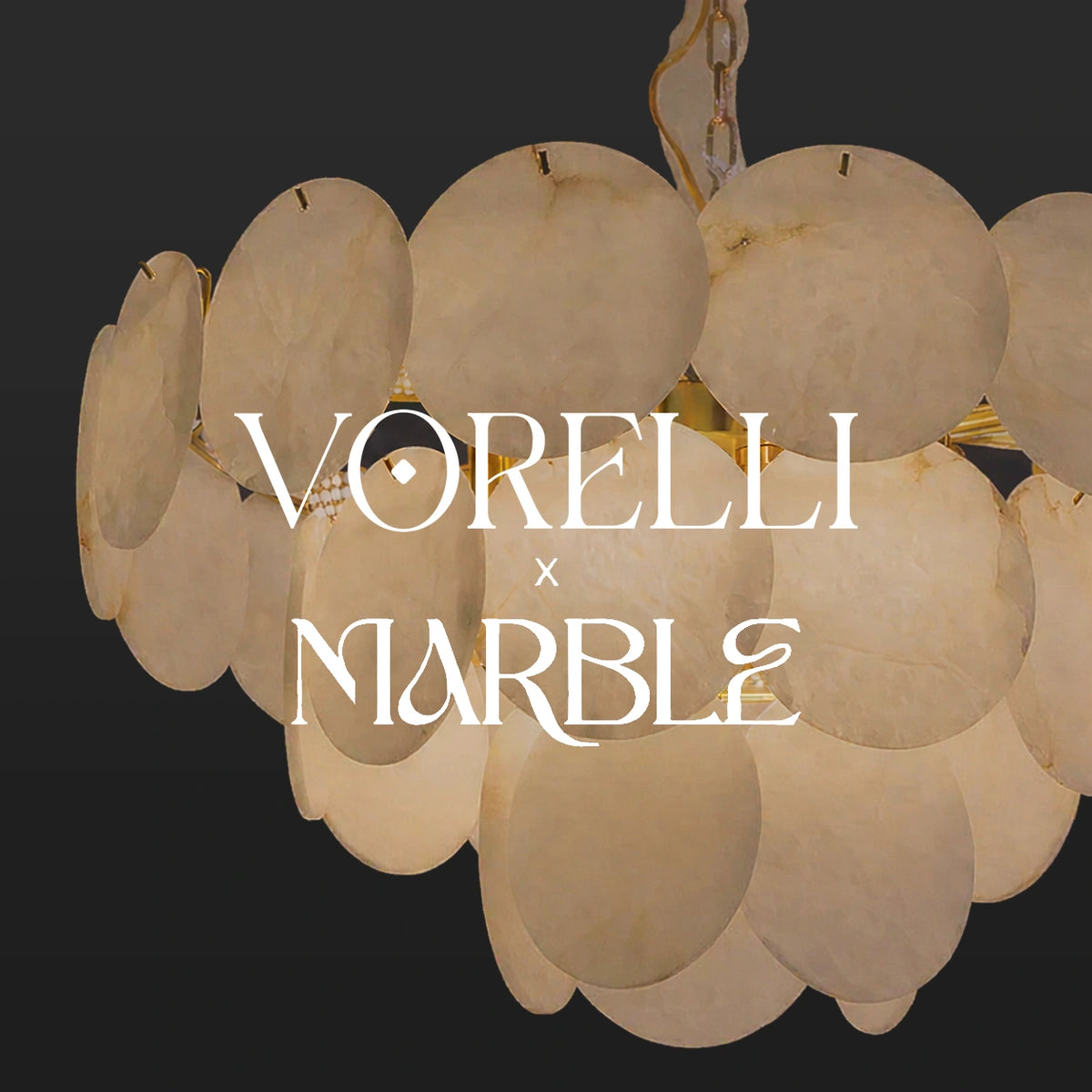 VORELLI® x Marble lighting collection — chandelier with layered pale stone discs.