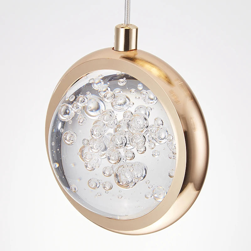 Cluster pendant chandelier by VORELLI® showcasing warm glowing orbs suspended for statement stairwell and foyer lighting