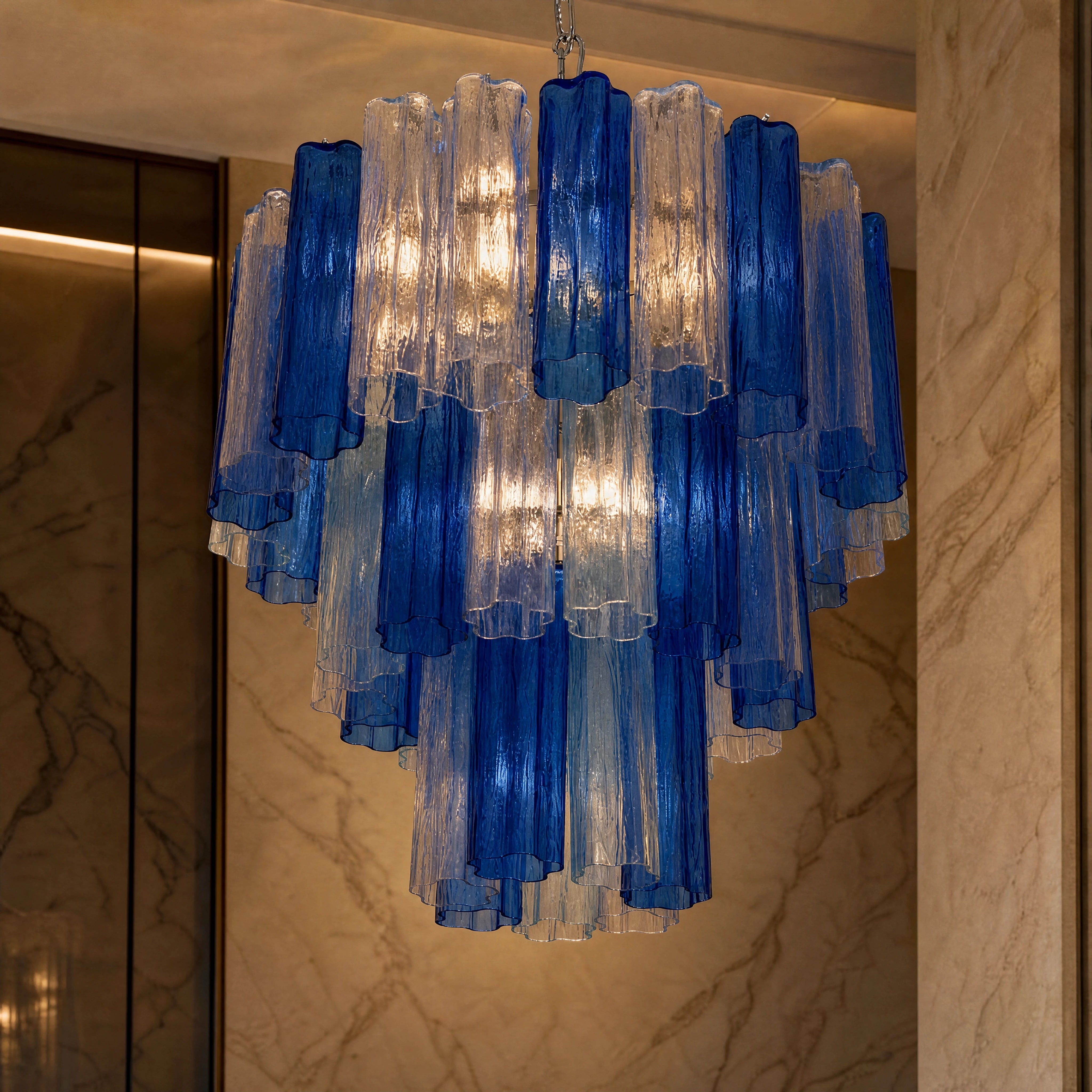Matilde Tronchi Murano Glass Staircase Chandelier close-up luxury lifestyle hero image by VORELLI
