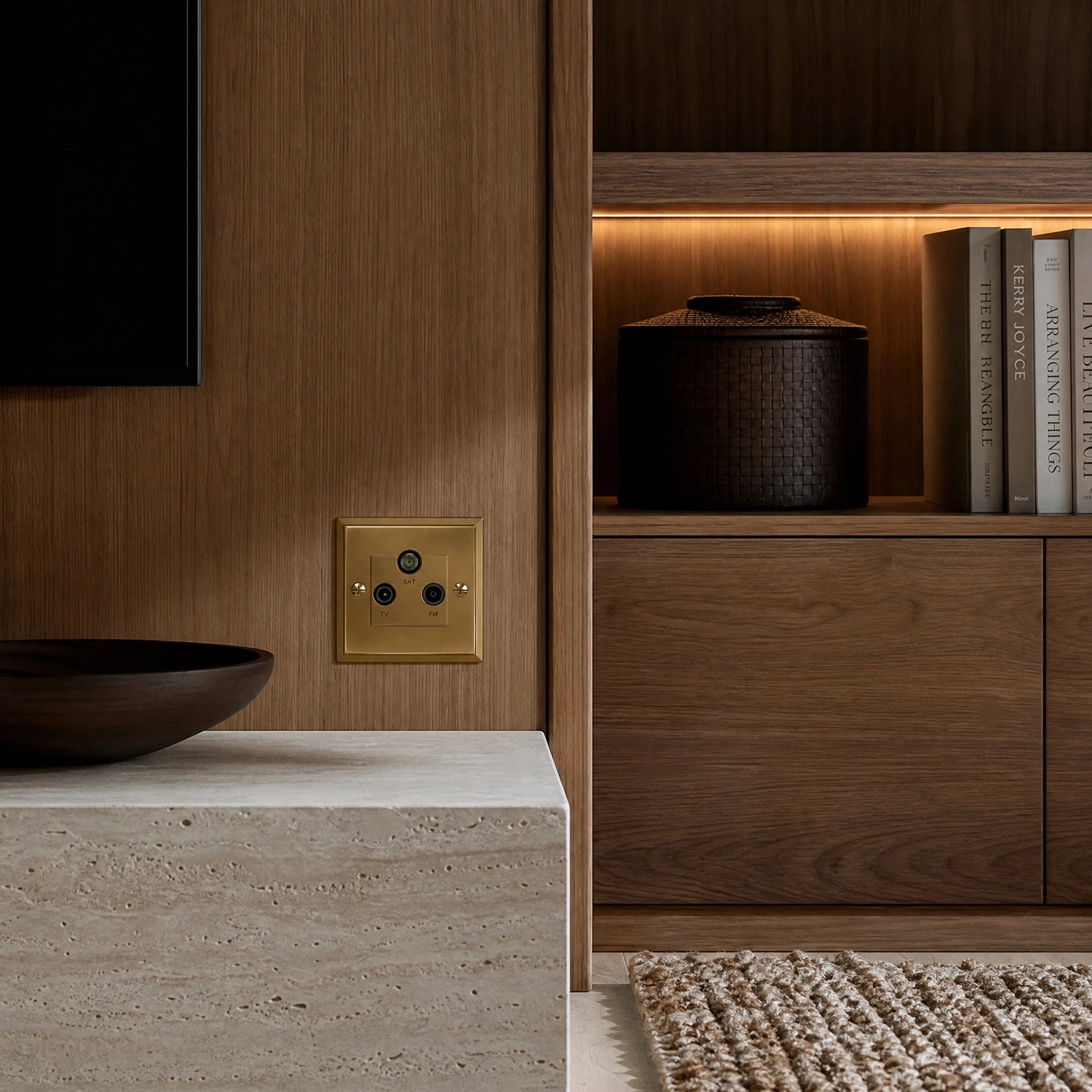 Luxury antique brass media outlet installed within bespoke media wall or integrated TV joinery in a private residence in a UHNW interior by VORELLI®.