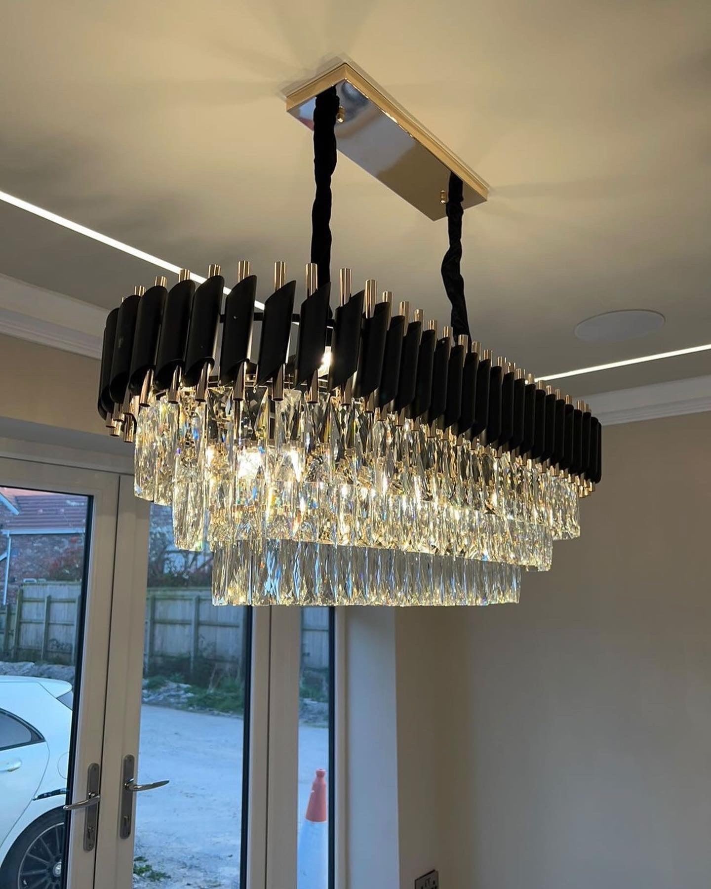 VORELLI® Milltimber crystal rectangular chandelier with layered diamond cut rectangular crystals in modern interior