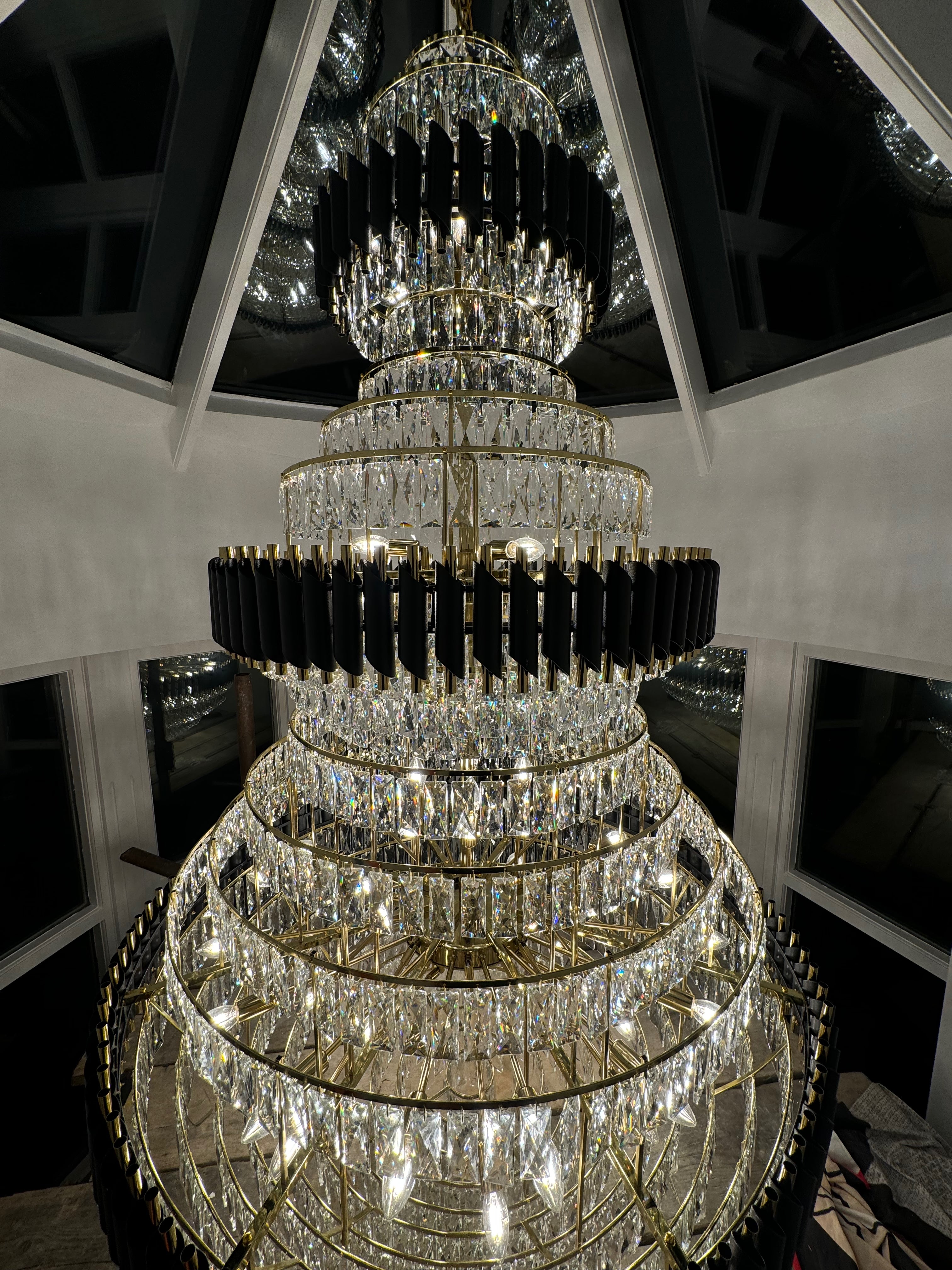 Upper tier crystal detail of the VORELLI Milltimber Grandeur Staircase Chandelier II