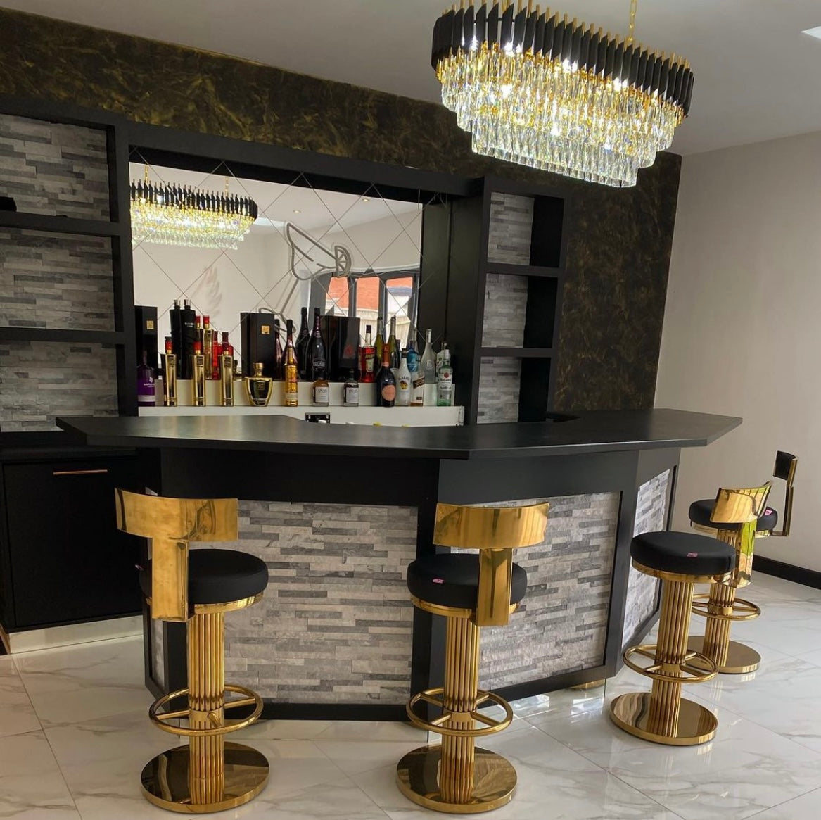 VORELLI® Milltimber rectangular chandelier illuminating contemporary open plan living and bar space