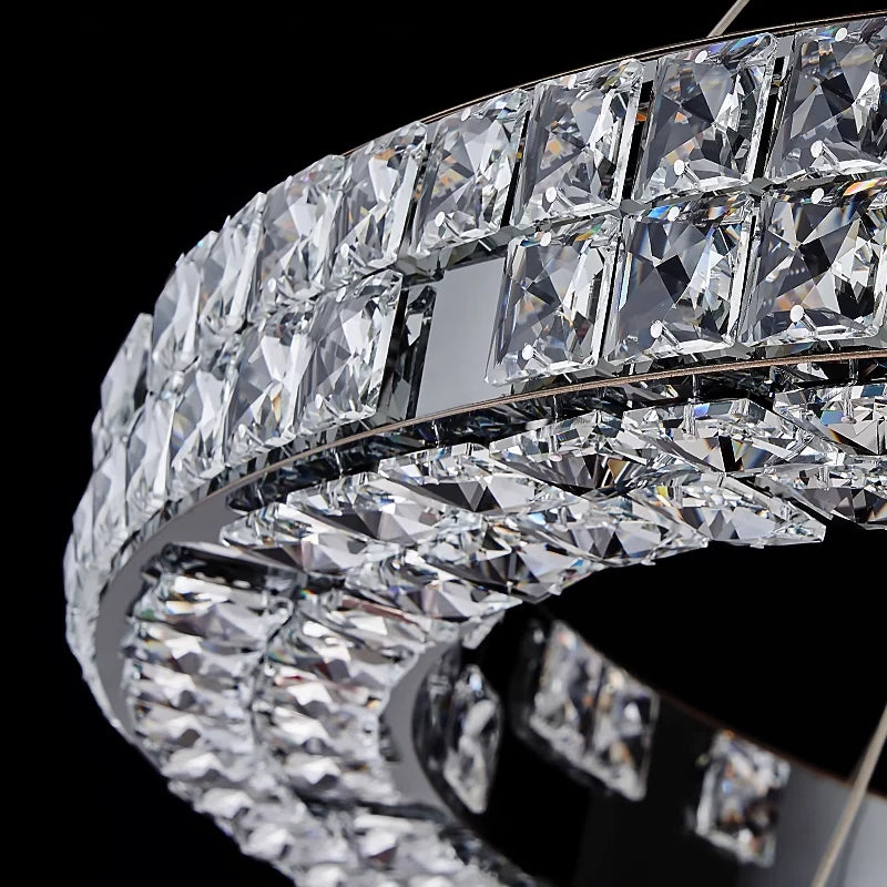 Close up of VORELLI® Minato circular chandelier showing precision cut crystal bars arranged along ring frame