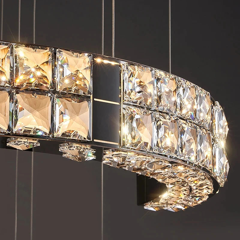 Detailed view of the spiral tier structure on the VORELLI® Minato staircase chandelier highlighting modern suspended lighting and elegant crystal glow